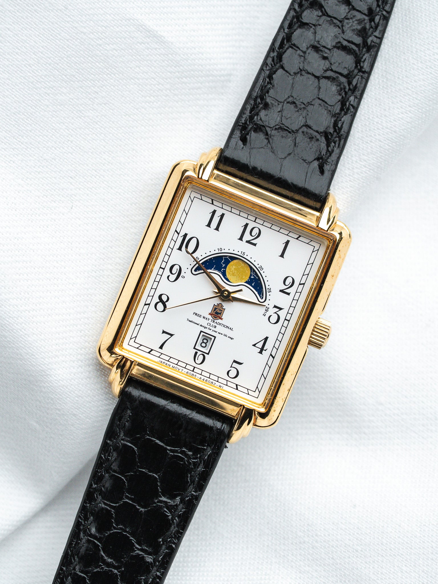 Vintage Free Way Traditional Club watch with gold case, white dial, moon phase, black leather strap
