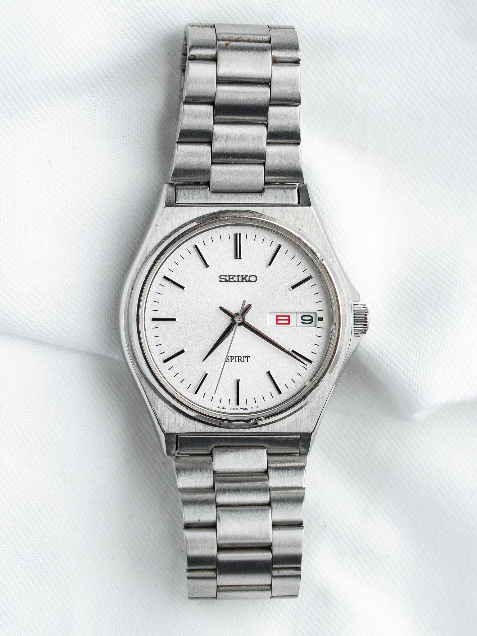 Seiko Spirit 7N43-7180 Acier — Cadran Blanc Sablé Jour Kanji (1998)