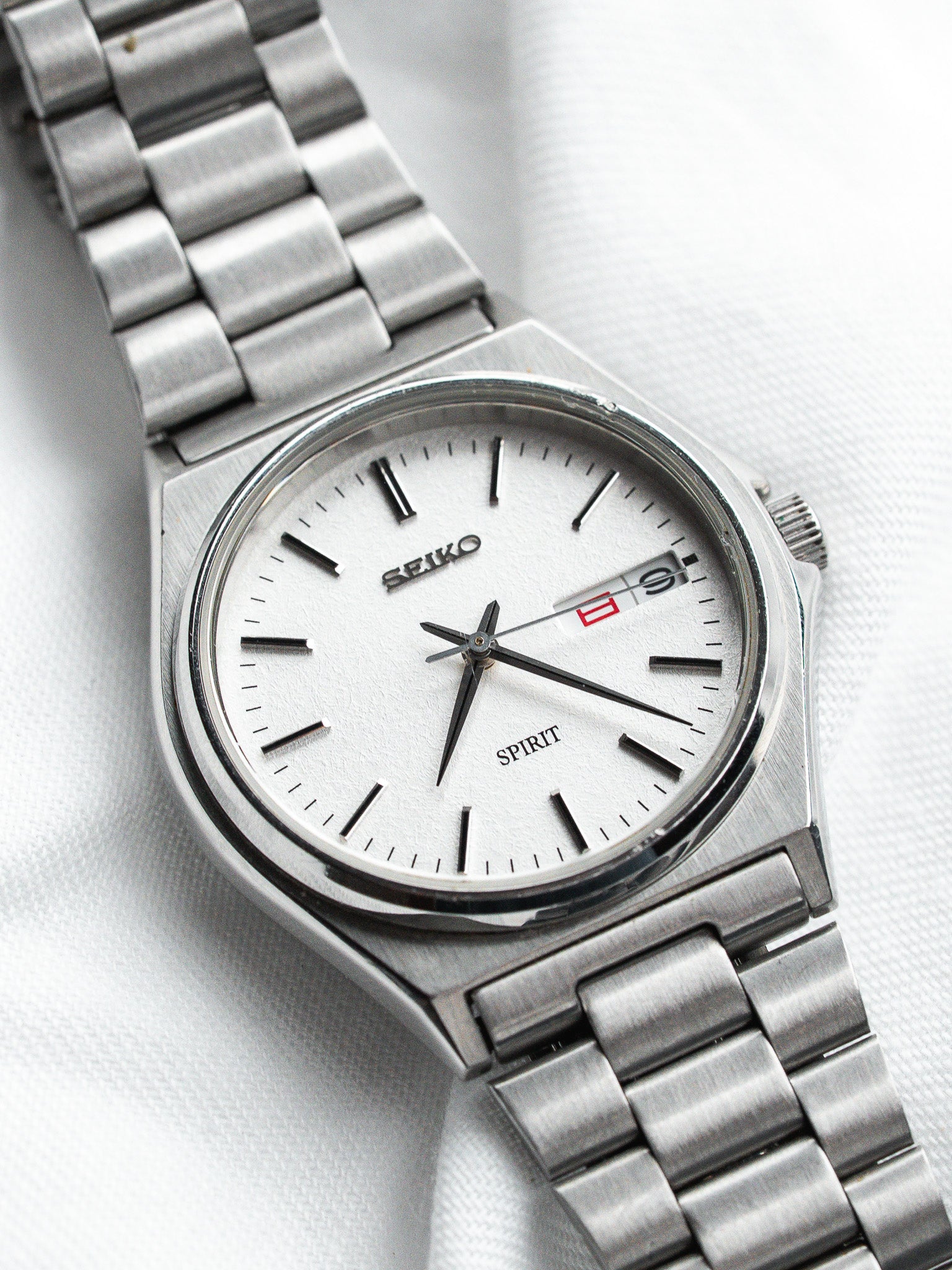 Seiko Spirit 7N43-7180 Acier — Cadran Blanc Sablé Jour Kanji (1998)
