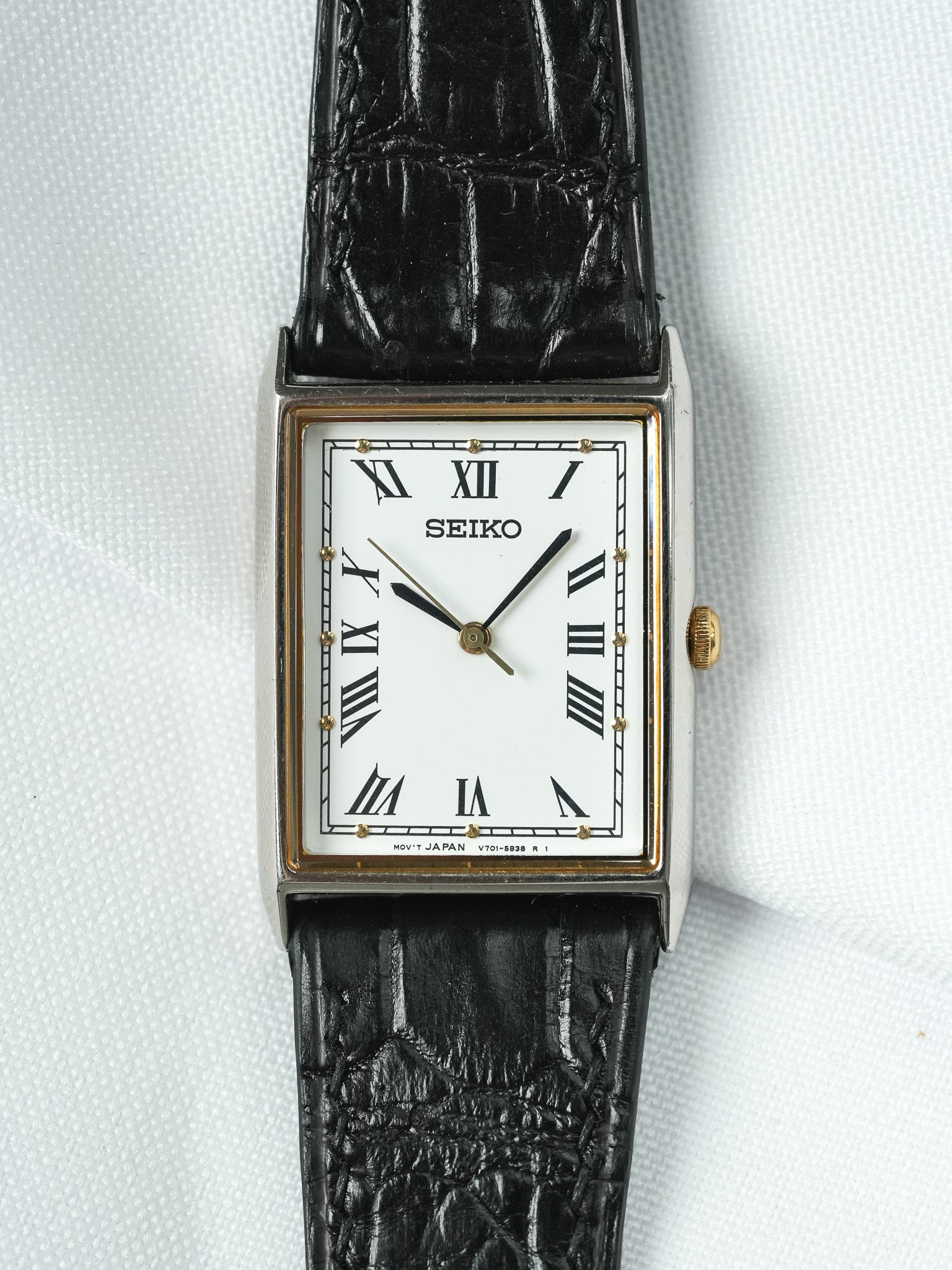 Montre Seiko Vintage - Tank Acier Romain Inserts Or (1996)