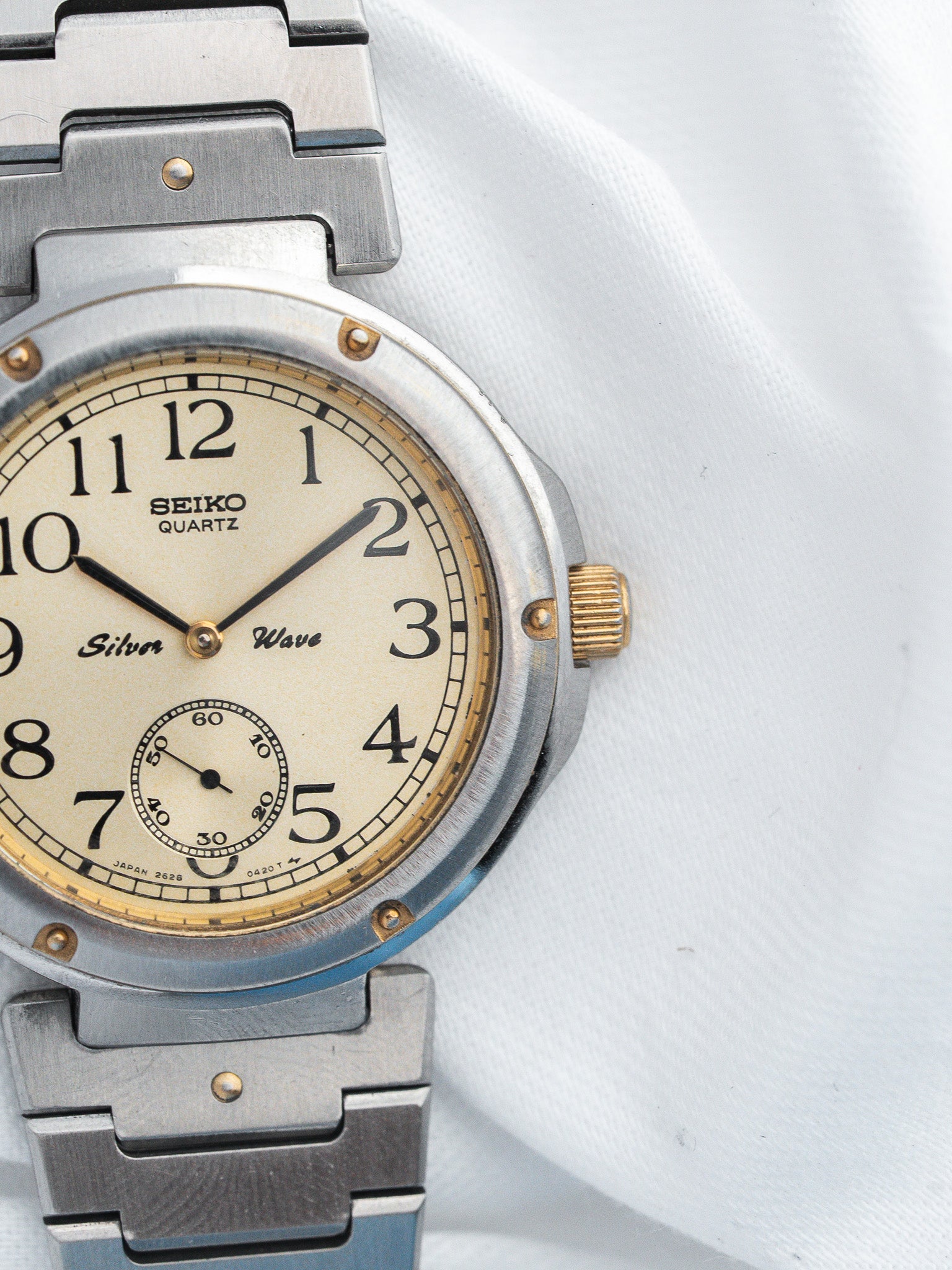 Seiko Silver Wave vintage quartz watch with cream dial and steel bracelet