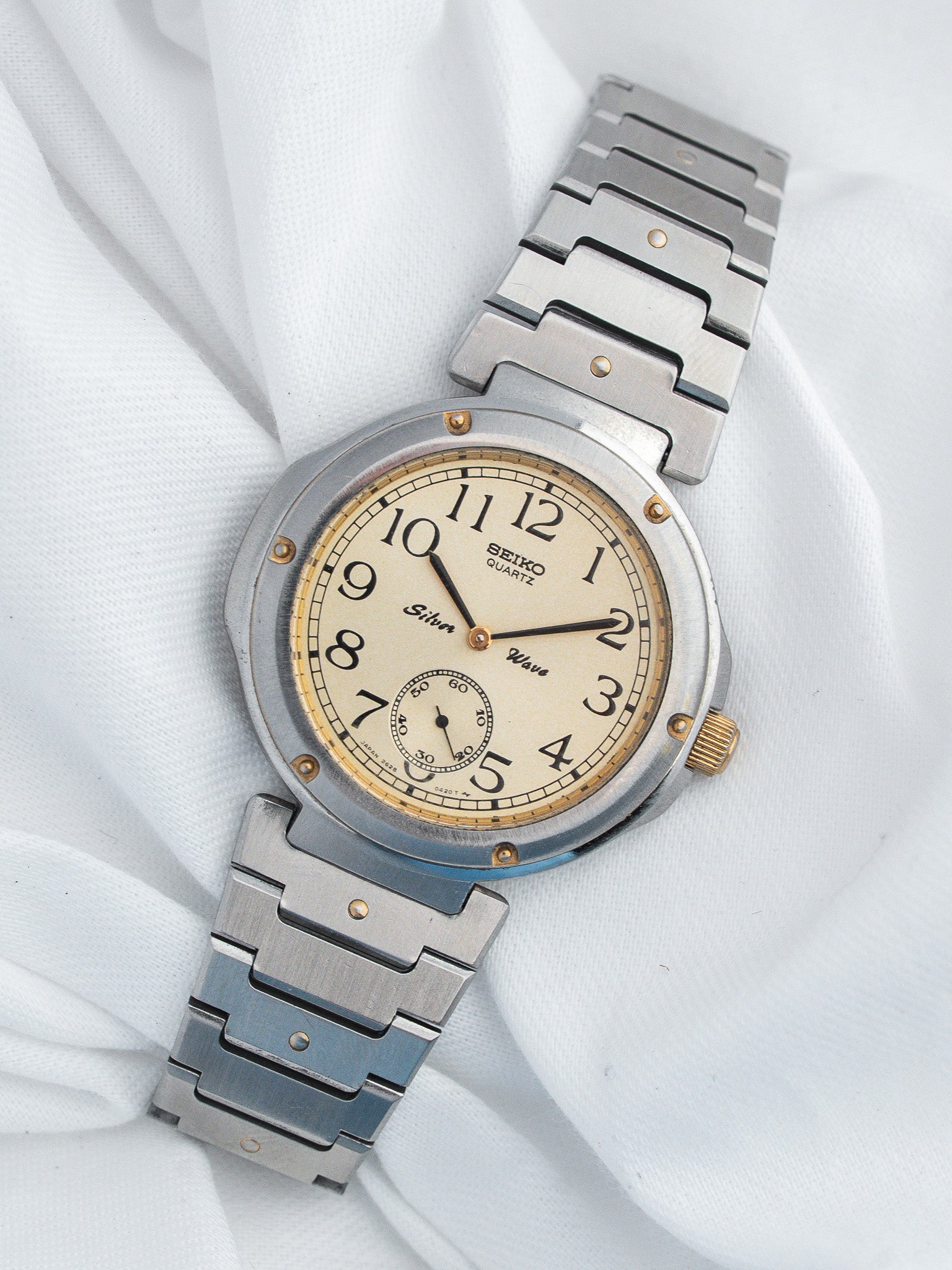 Seiko Silver Wave vintage quartz watch with cream dial and steel bracelet
