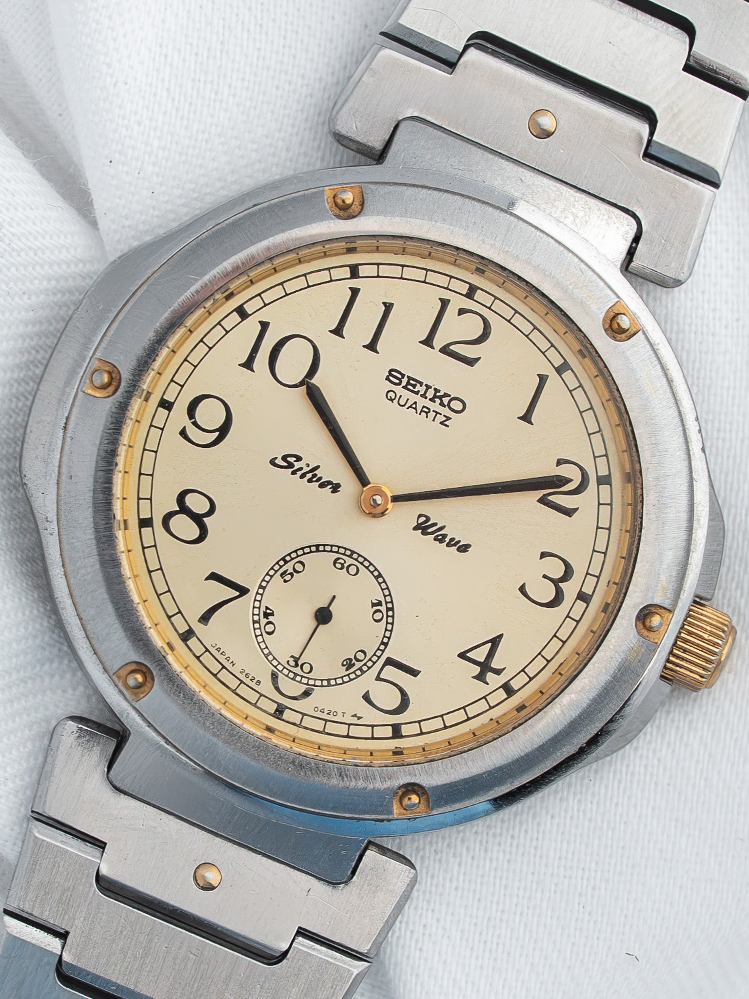 Seiko Quartz Silver Wave vintage watch with cream dial and steel bracelet