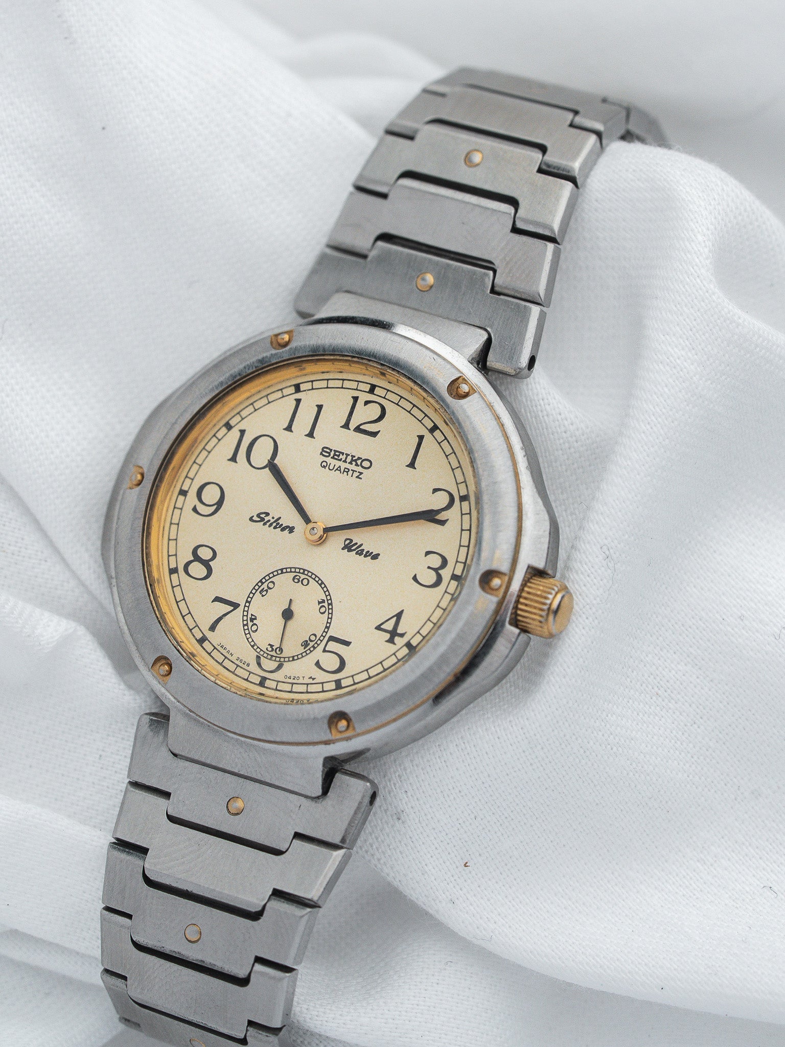 Seiko Silver Wave vintage quartz watch with cream dial and steel bracelet