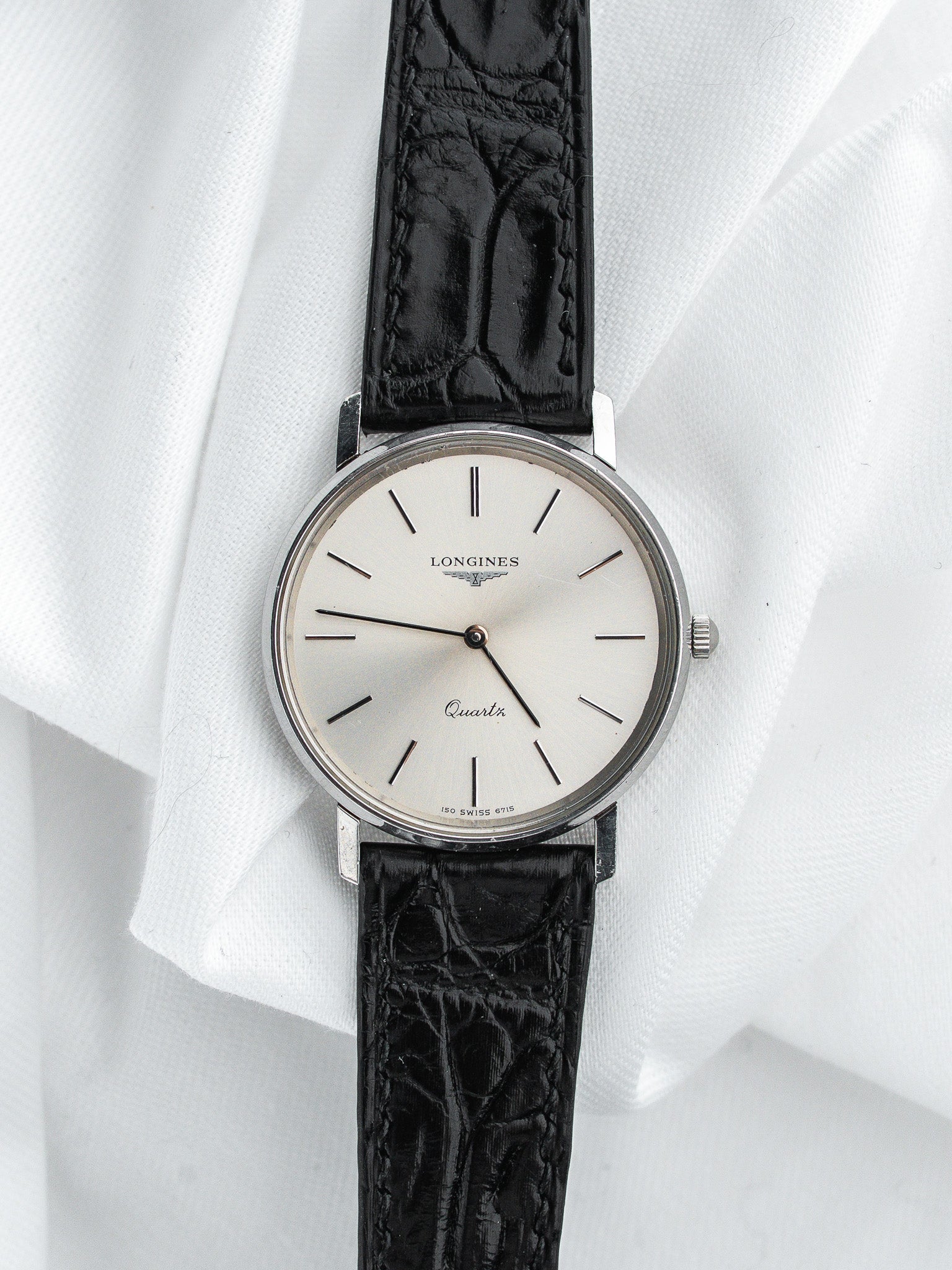 Longines Quartz Watch 精钢 — 银色太阳纹表盘 镶贴时标 (1980s)