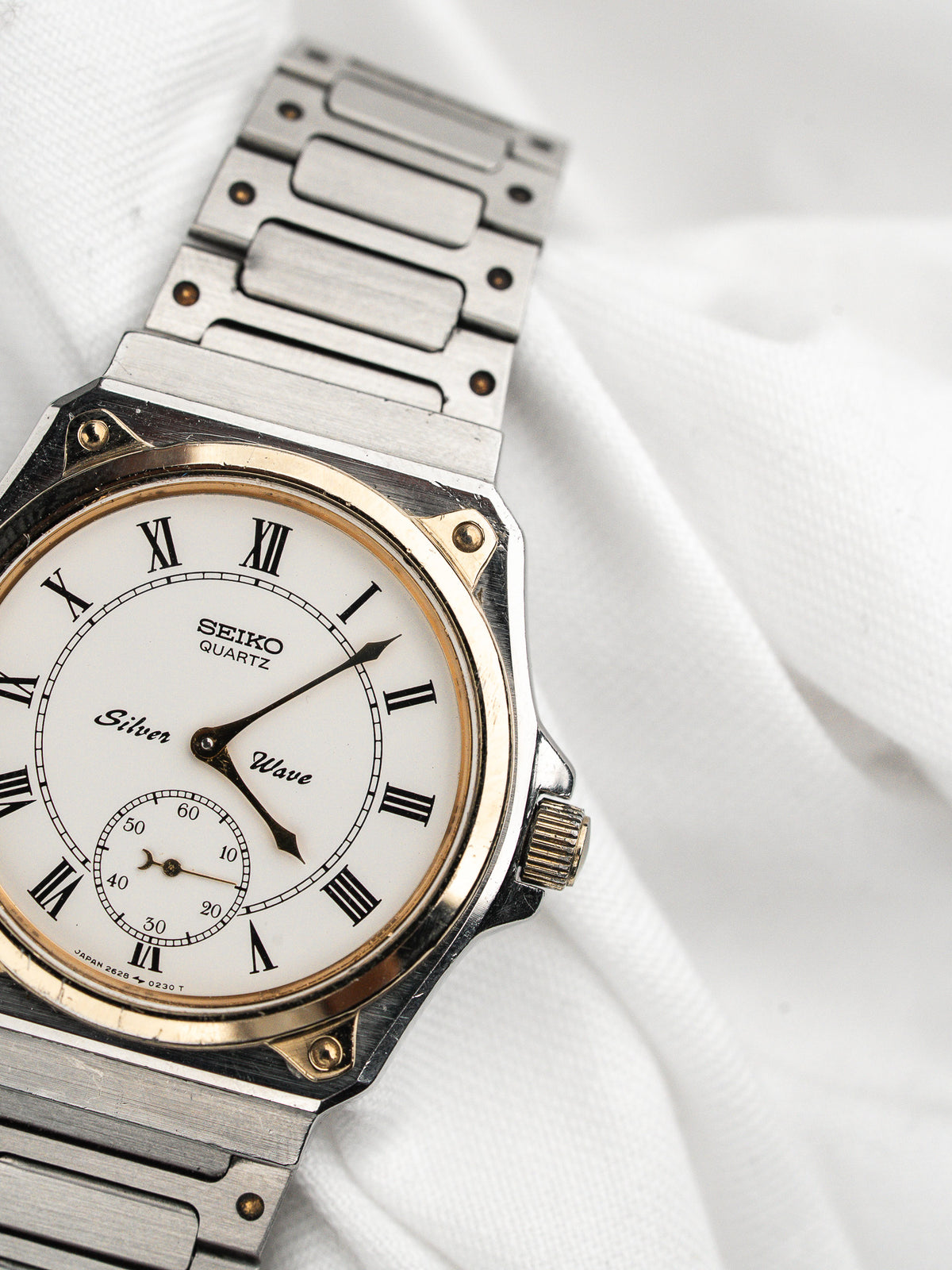 Vintage Seiko Silver Wave Watch in steel, white dial and Roman numerals