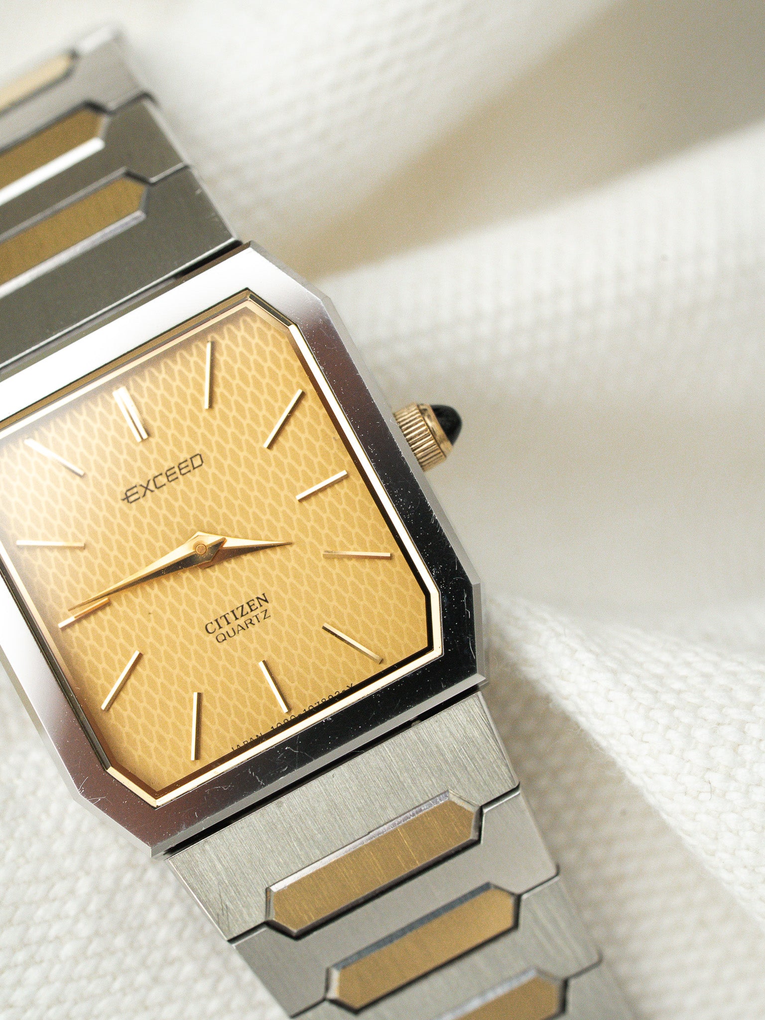 Vintage Citizen Exceed Steel Watch — Guilloché Gold Dial (1981)
