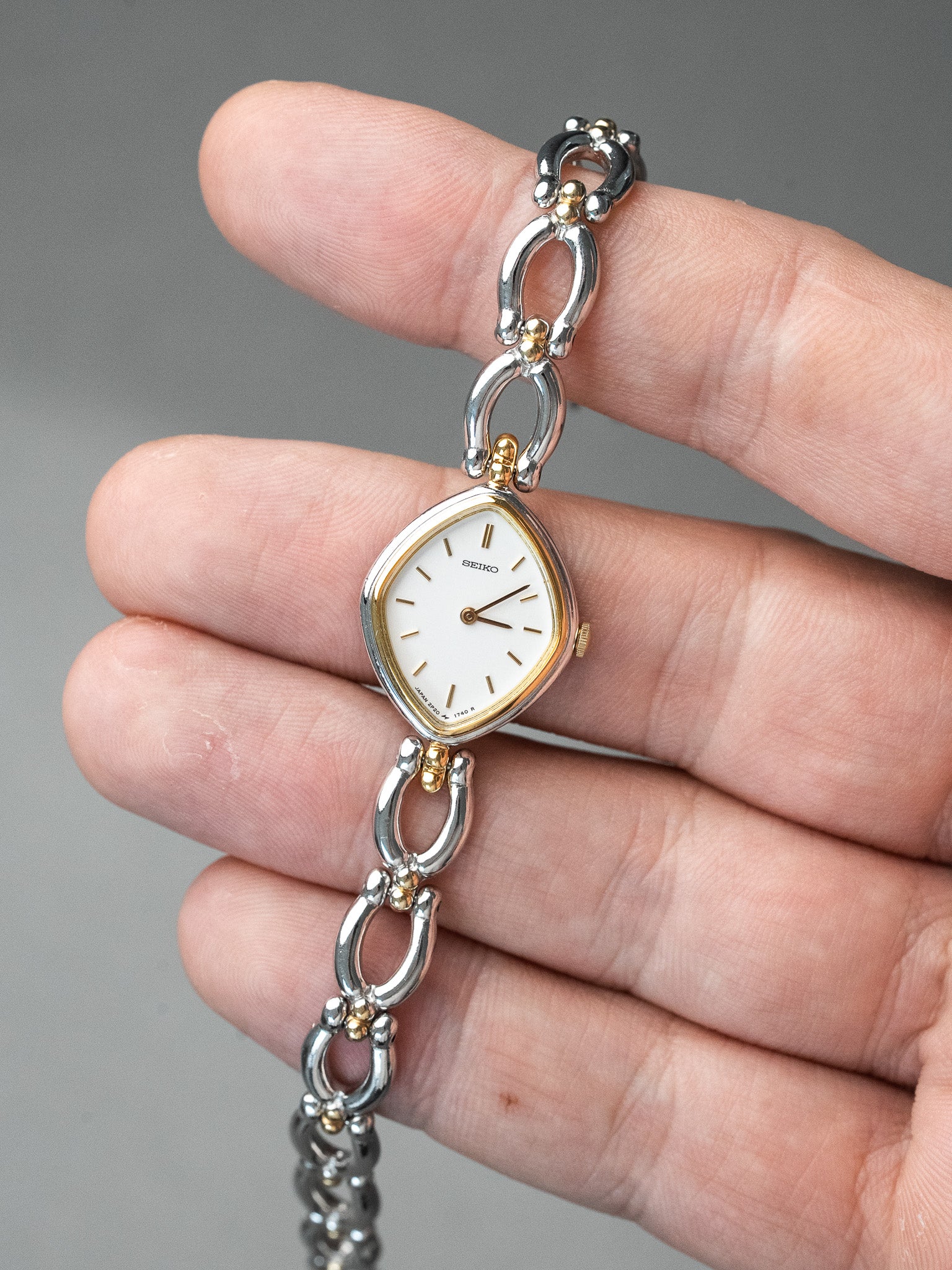 Orologio Seiko Vintage Losange Acciaio e Oro 2P20 — Quadrante Bianco (1989)