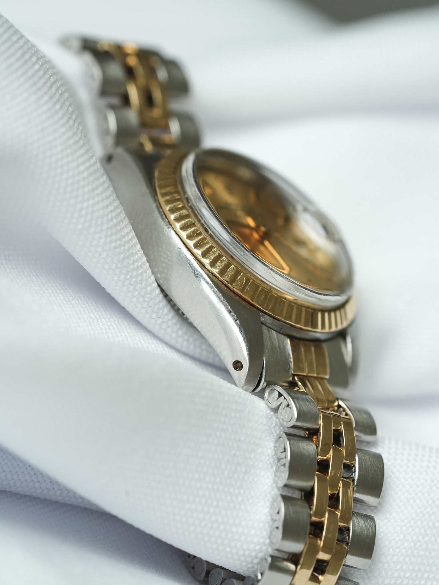 Rolex - Oyster Perpetual 26mm 6917 Gold Stahl Jubiläum Zifferblatt Gold Geriffelte Lünette - 1973