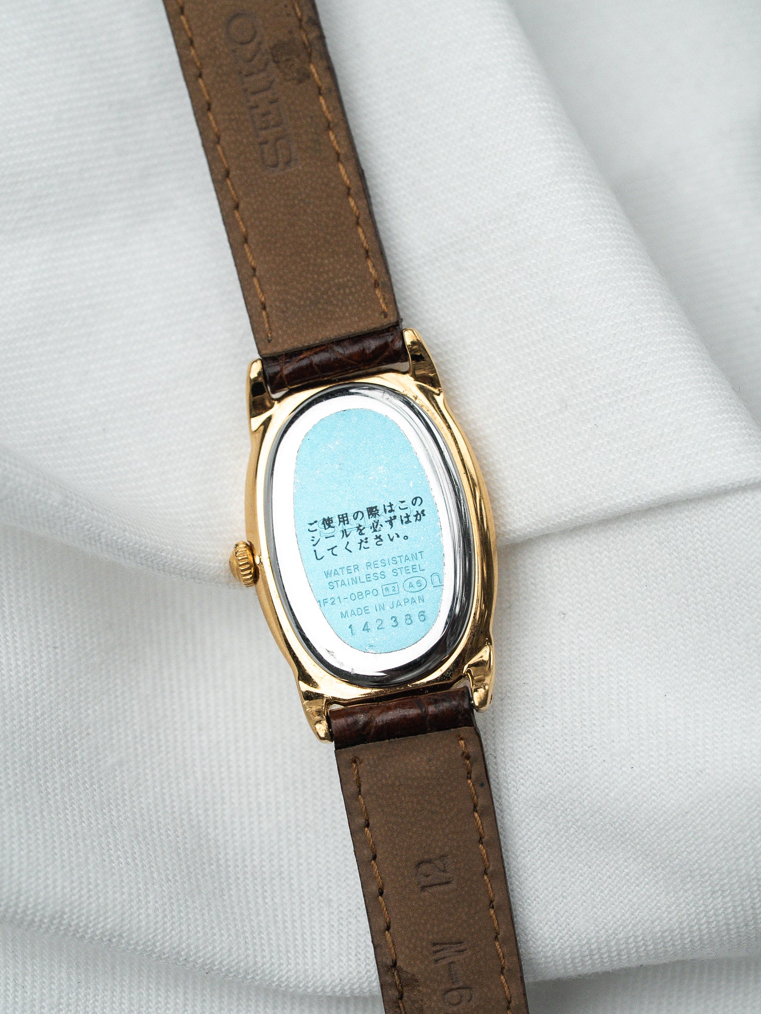 Orologio Seiko Baignoire placcato oro — quadrante marrone con cifre arabe (2001)