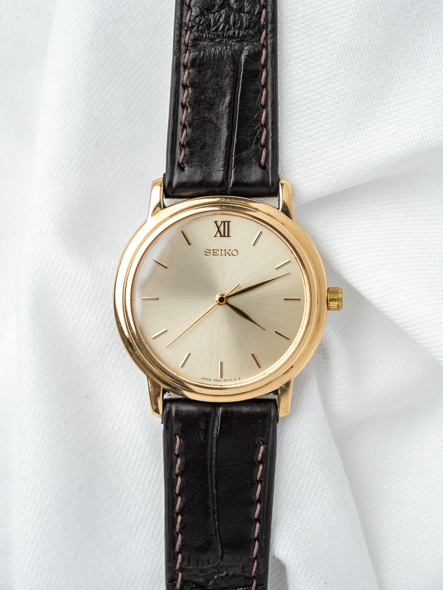 Orologio Seiko 5S21 placcato oro — secondi continui (1989)