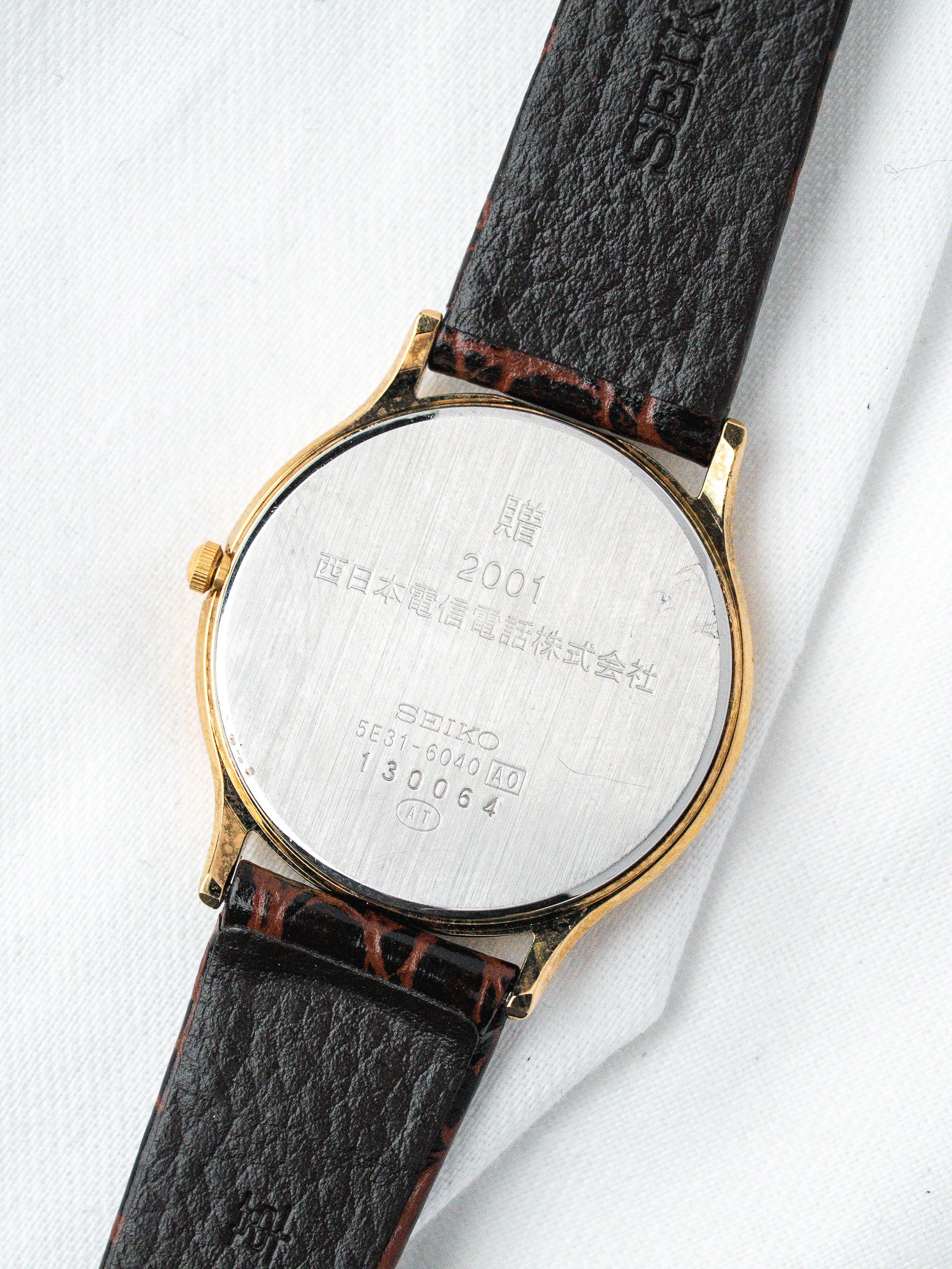Винтажные часы Seiko 5E31-6040 позолоченные — циферблат с римскими цифрами, пескоструйная отделка (2001)