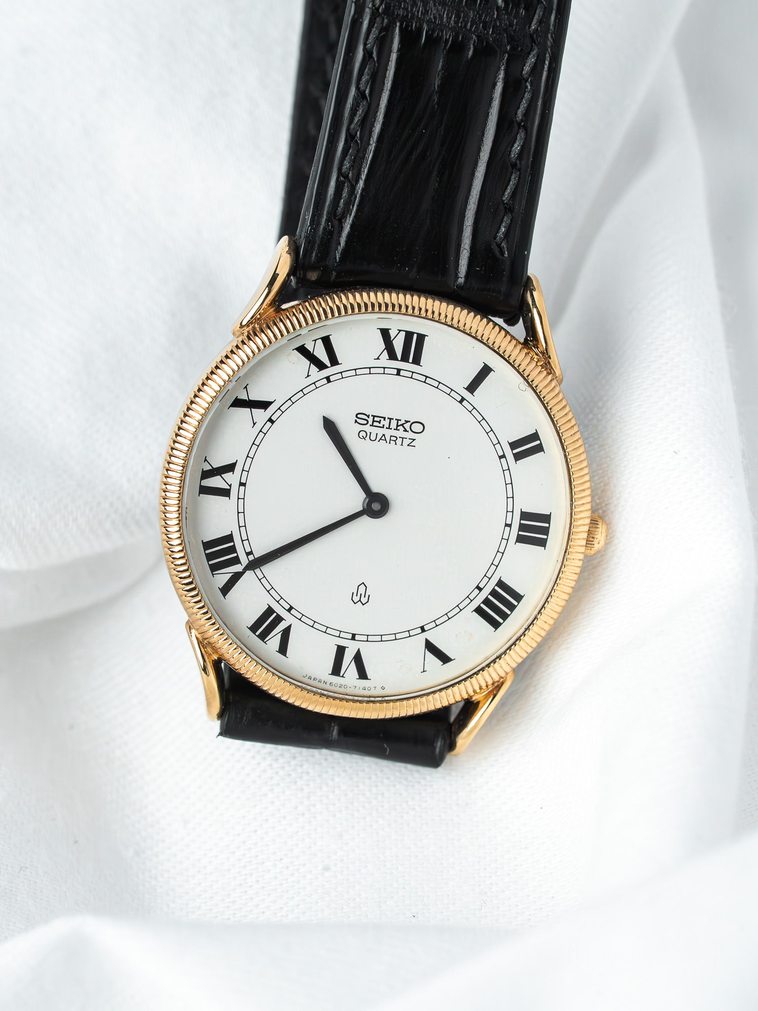 Montre Seiko 8020-7080 Plaqué Or — Cornes de Vache Guillochée (1983)