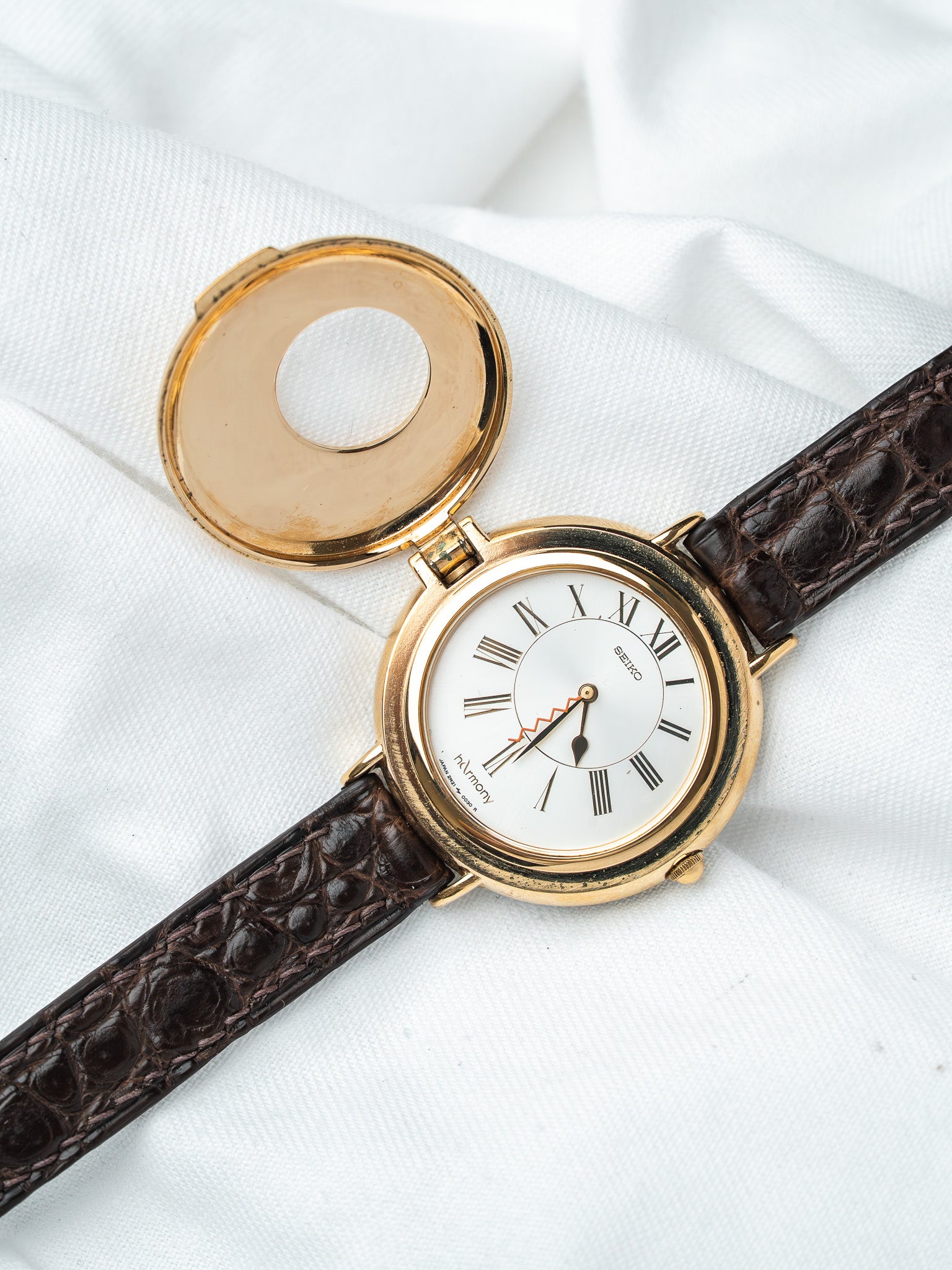 Orologio Seiko hArmony 2N21-0010 placcato oro — copertura musicale (1988)