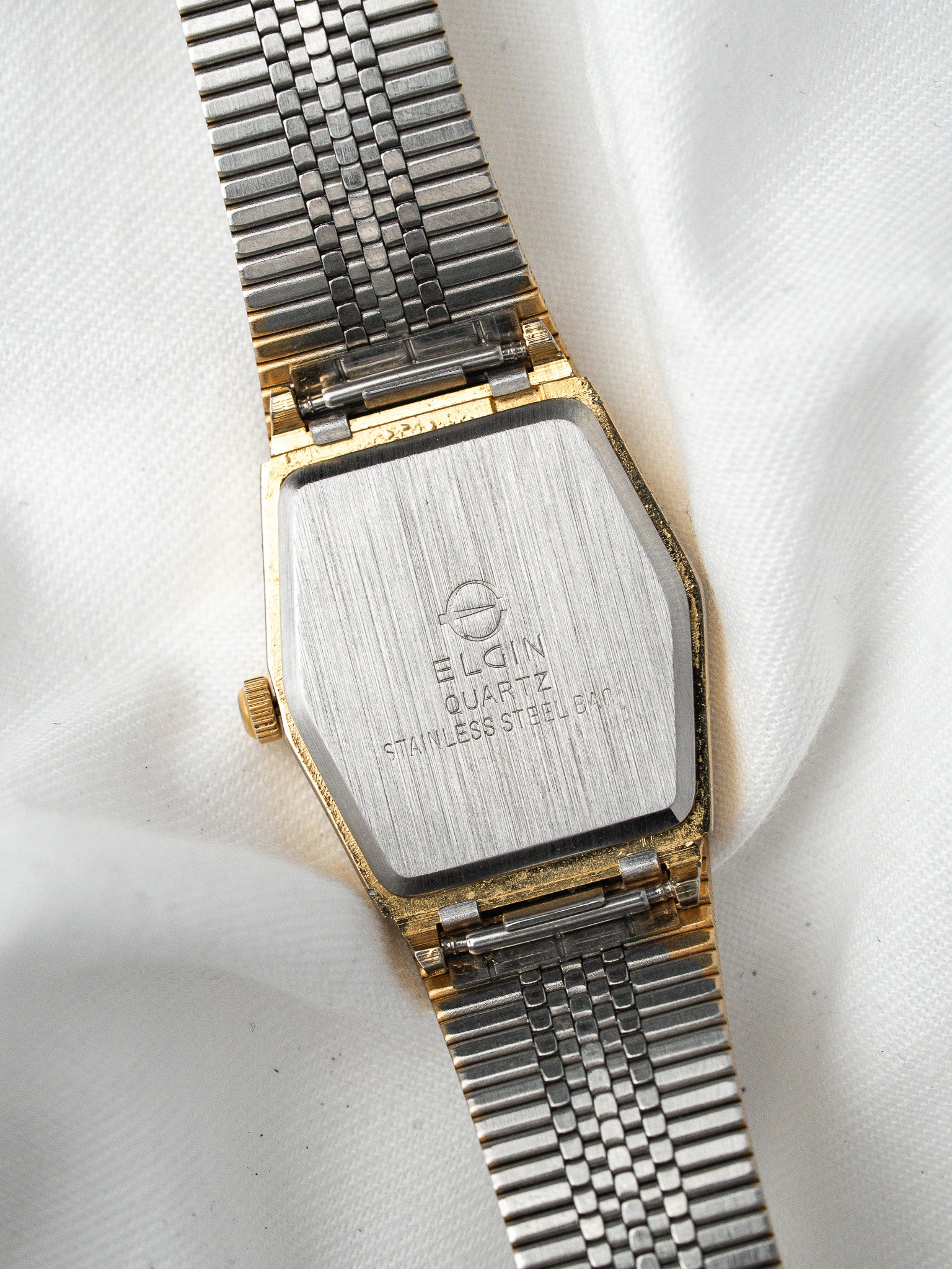 Montre Elgin Hexagonale Bicolore — Cadran Noir Pailleté (1981)