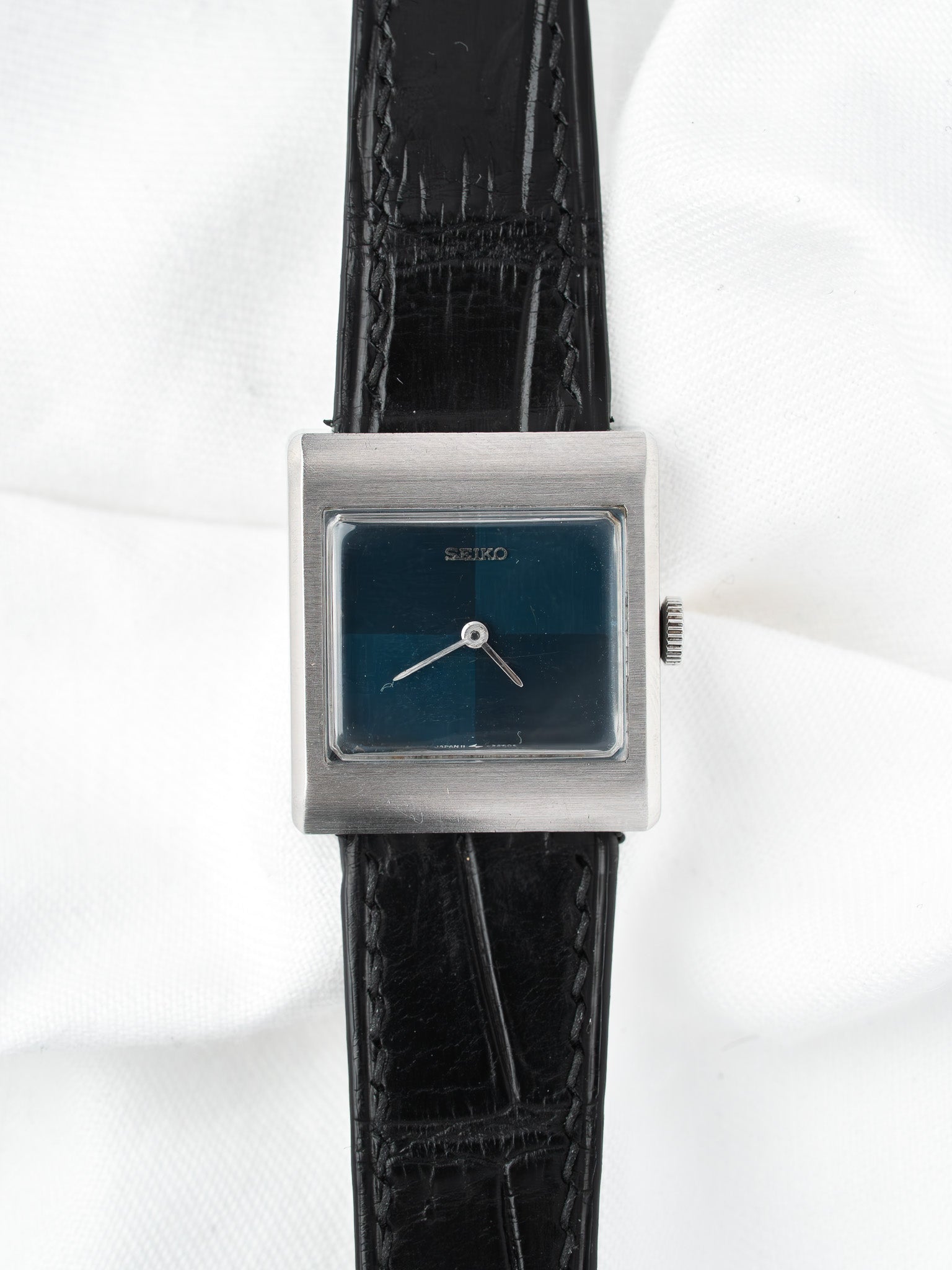 Seiko vintage watch with square case, blue dial, black leather strap