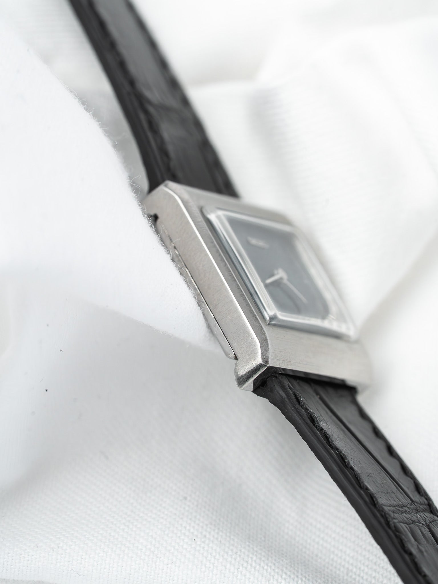 Cartier Tank vintage watch with rectangular case and black leather strap