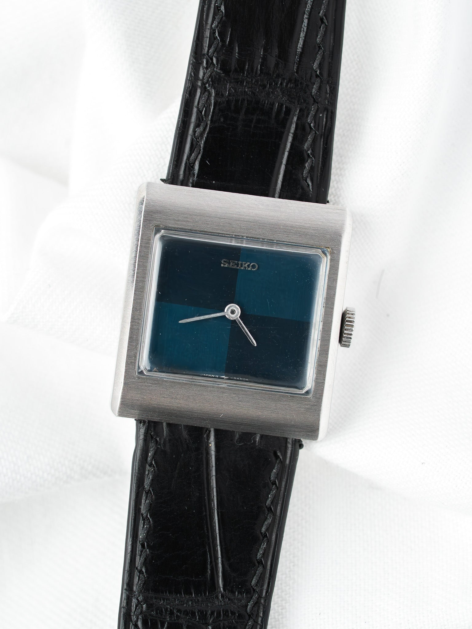 Seiko vintage watch with square case, blue dial, black leather strap