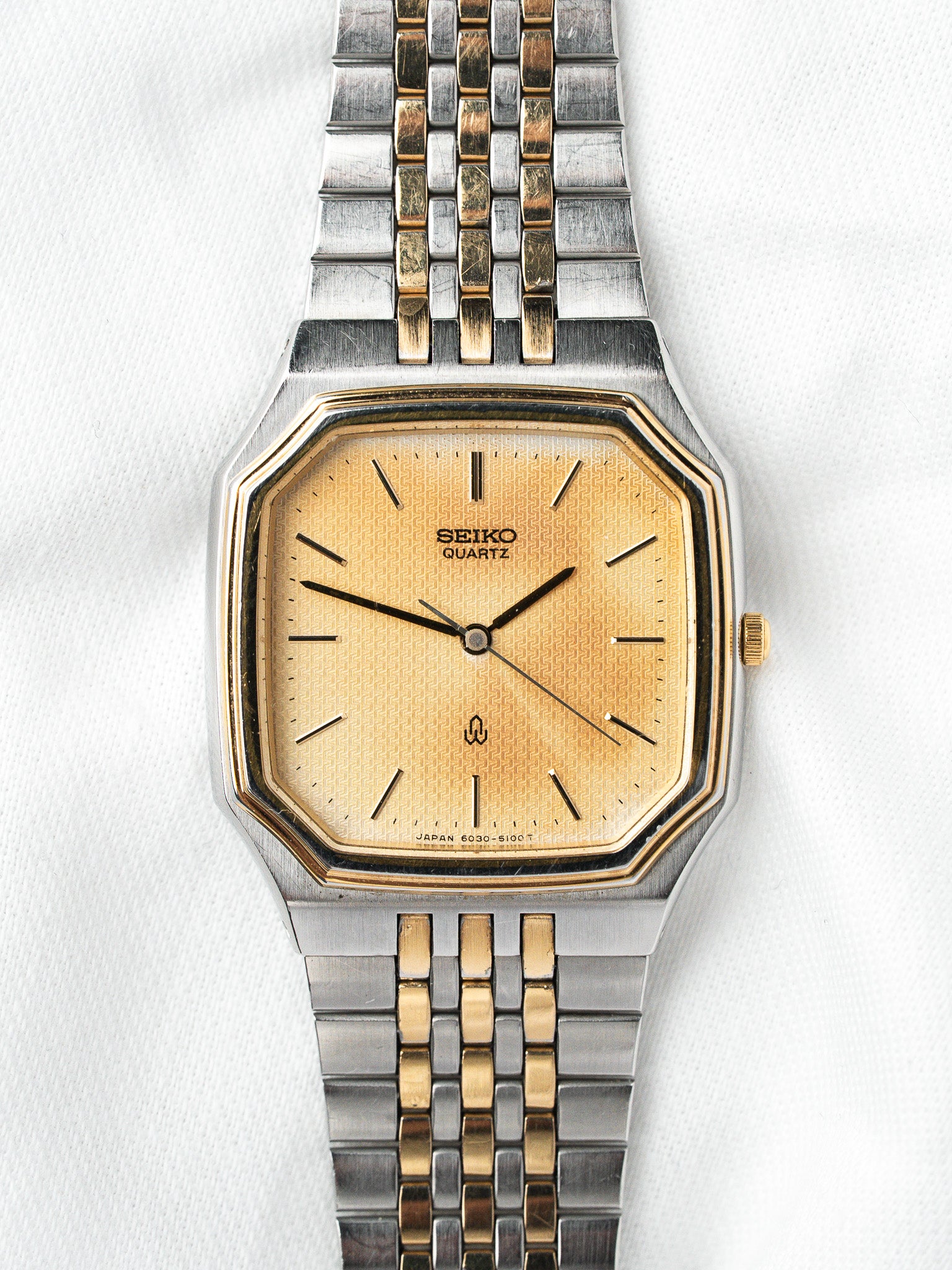Seiko Watch Oktogonal Bicolor — Goldenes guillochiertes Zifferblatt (1988)