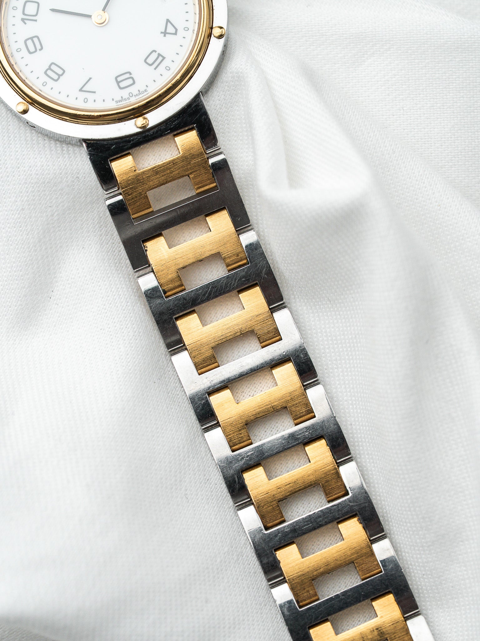 Montre Hermès Clipper 34mm Bicolore — Lunette Rivetée (1990s)