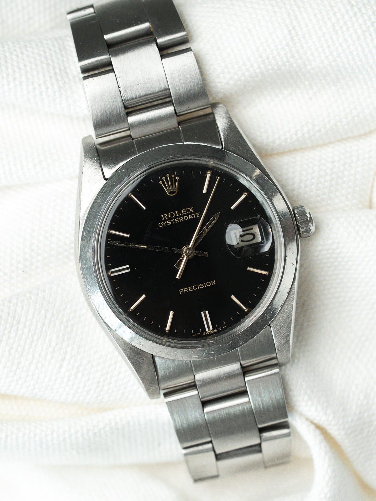 Boîtier Oyster acier de profil - Montre Rolex Oysterdate 6694 cadran noir - Atelier Victor