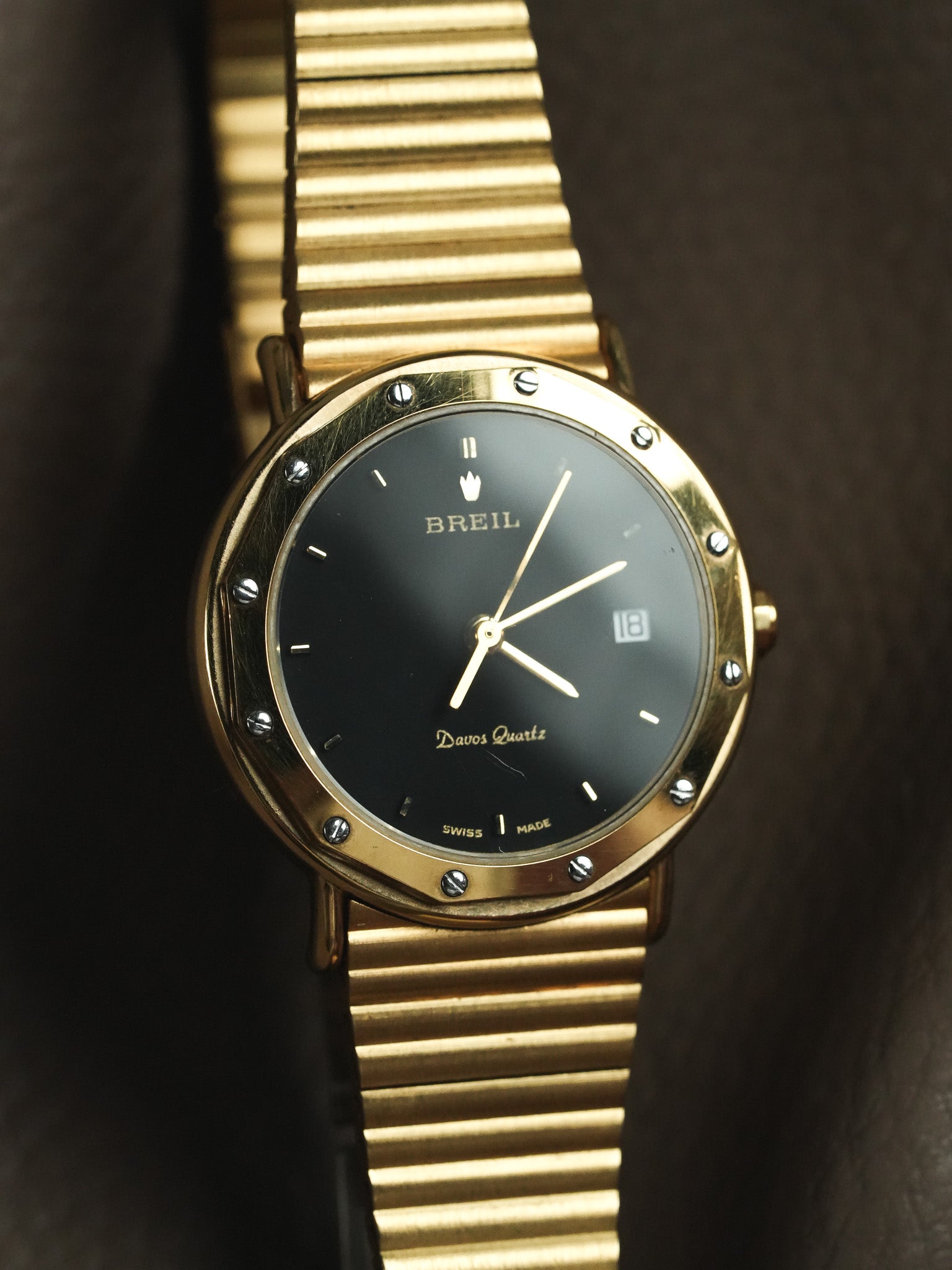 Breil - Gold integral screwed bezel black dial - New from stock - 1990s