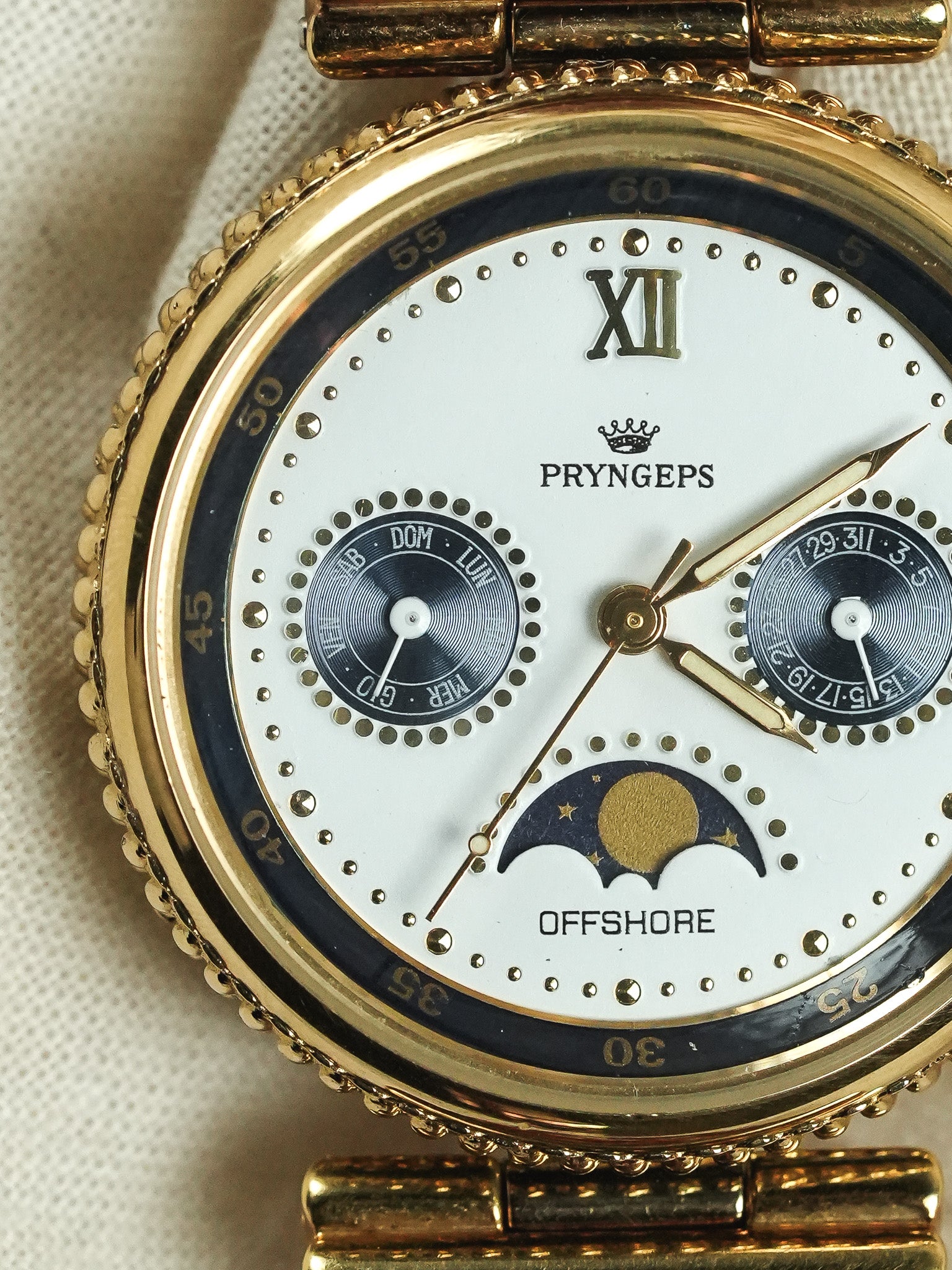 Pryngeps - Dreifachdatum Mondphasen-Guilloché-Lünette Gold - NOS - 1990s