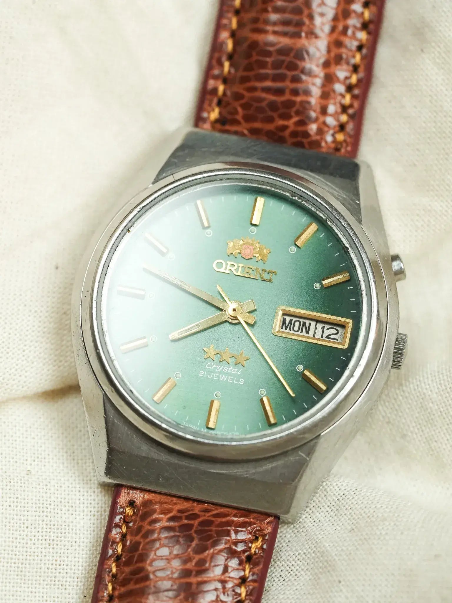 Orient - Daydate Cadran Vert cuir marron - 1970s
