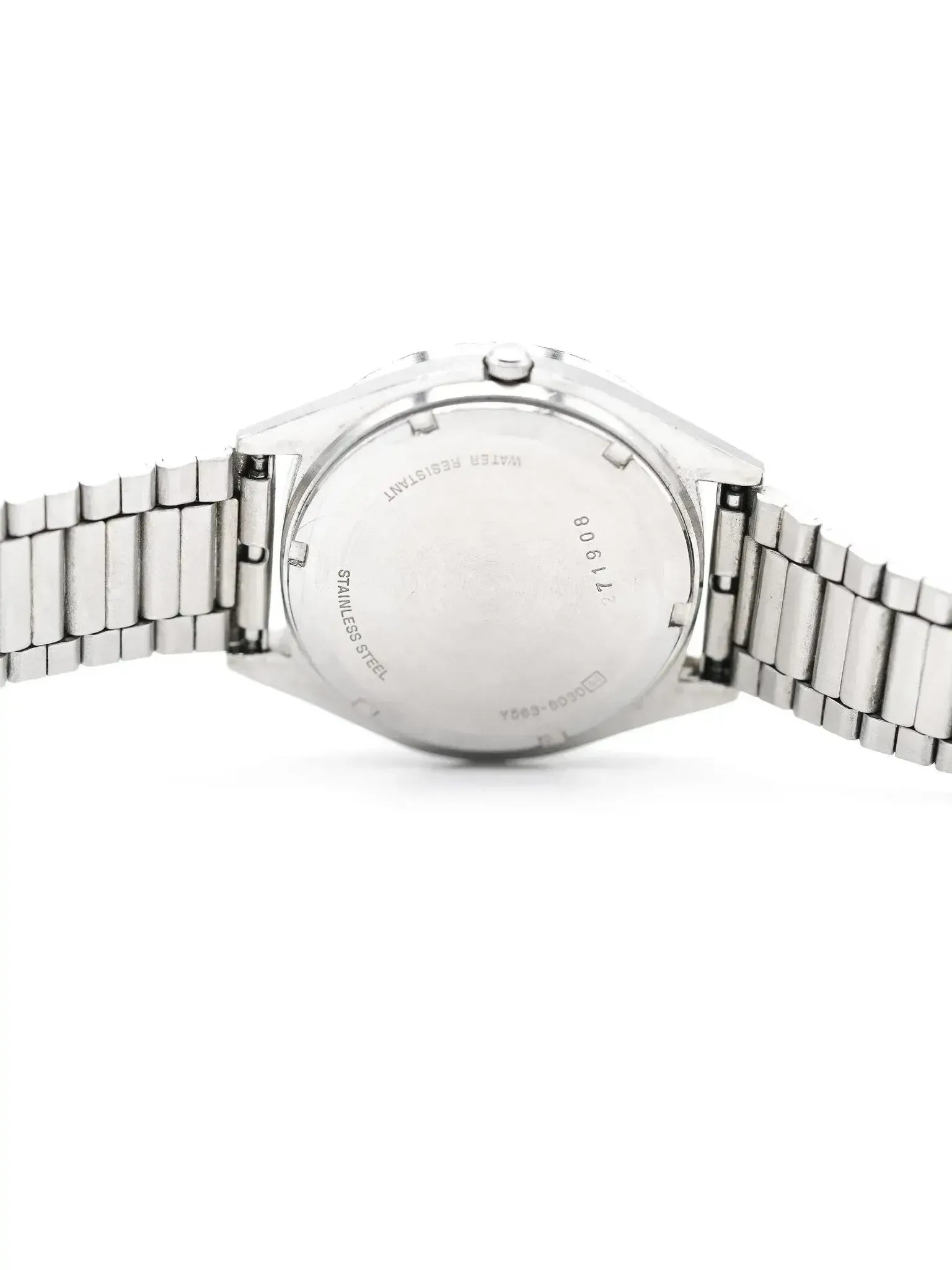 Stainless steel watch back with engraved serial number and water resistant marking