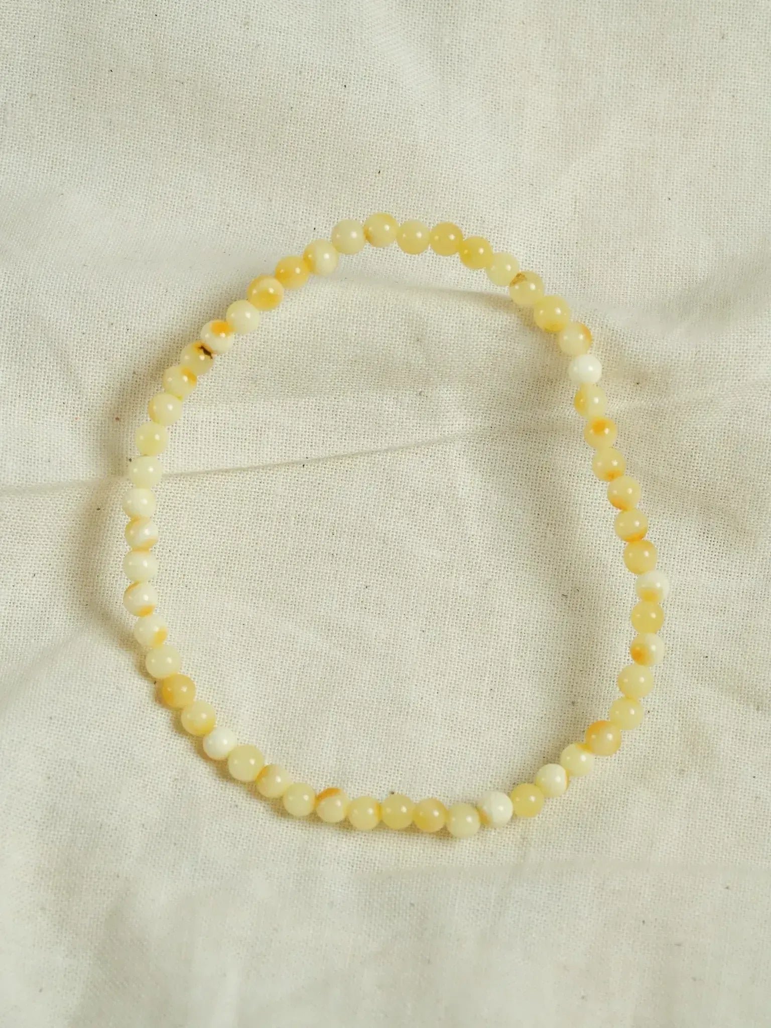 Bracelet en Ambre Baltique naturel - Rondes fines Jaune clair - Atelier Victor