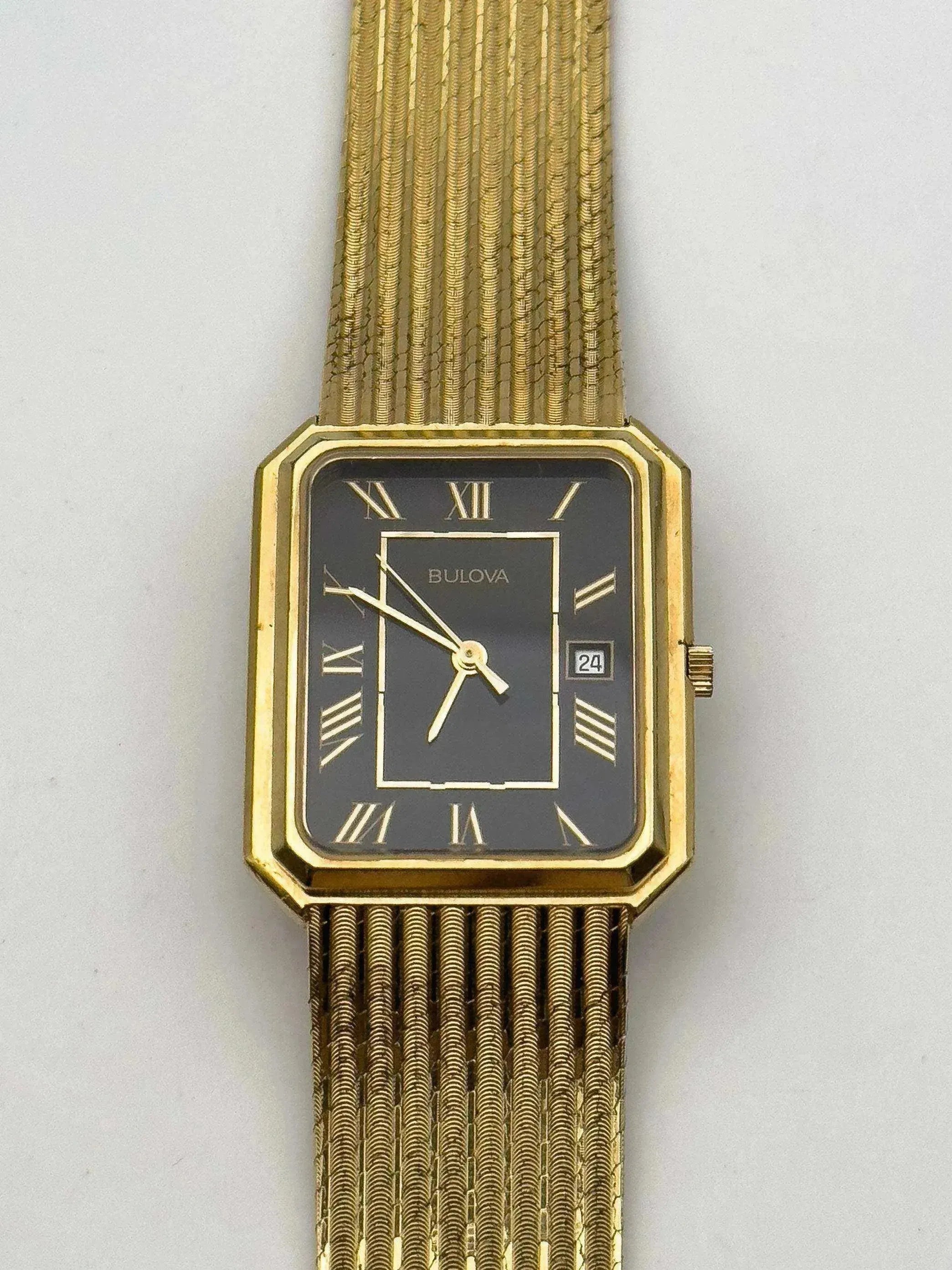 Bulova - Gold Bracelet / Black dial - 1994 - Atelier Victor Paris - Vintage Watch Shop Dubai