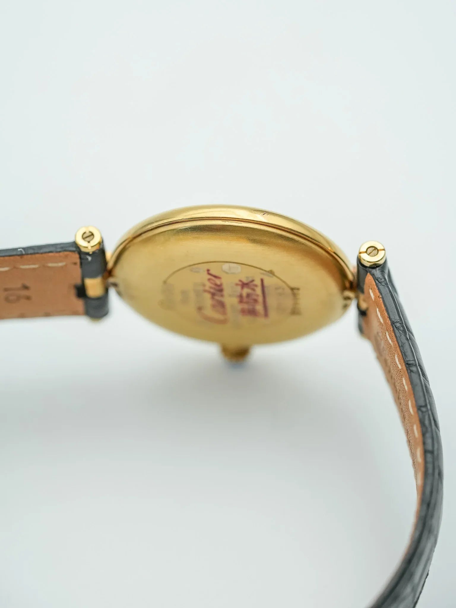 Cartier - Must de Vendôme vermeil Cadran noir avec boucle deployante - 1990s - Atelier Victor - Vintage Shop