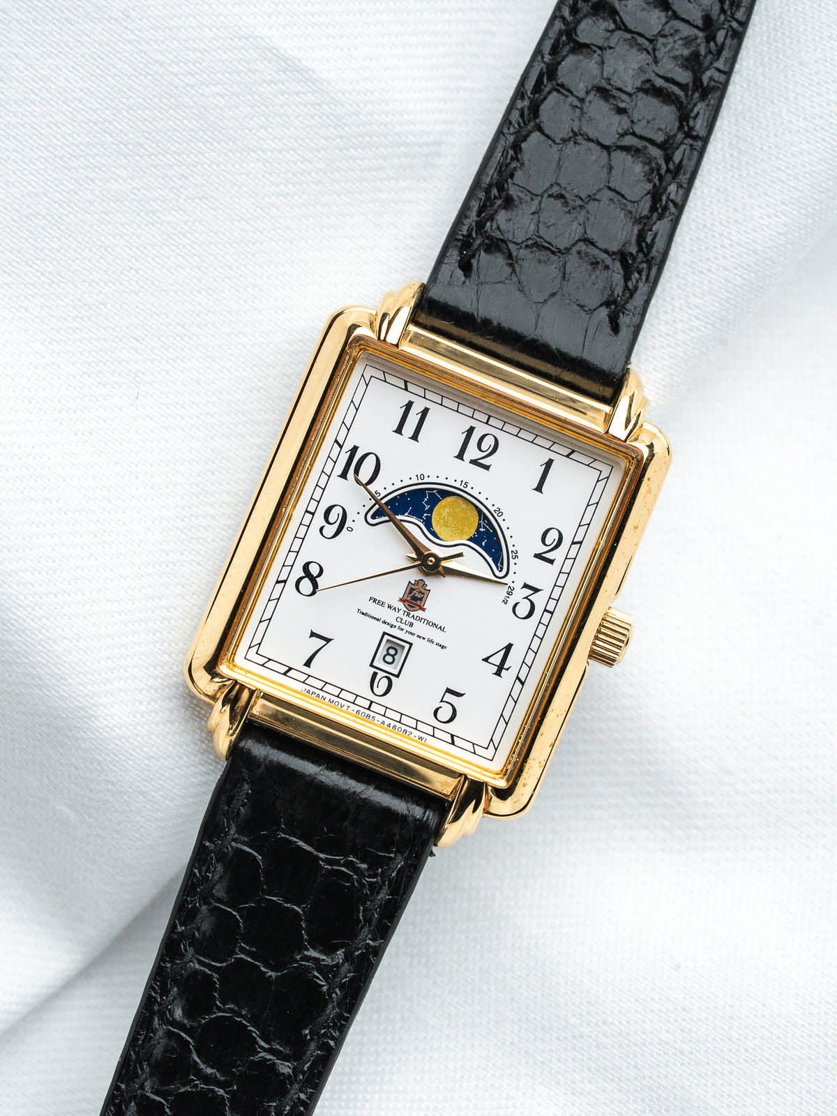 Vintage Free Way Traditional Club watch with gold case, white dial, moon phase, black leather strap