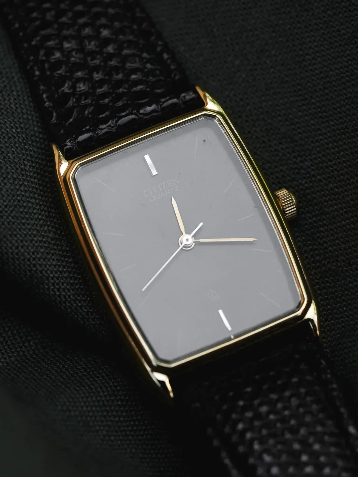 Citizen Quartz vintage watch with gold case, grey dial, black textured strap