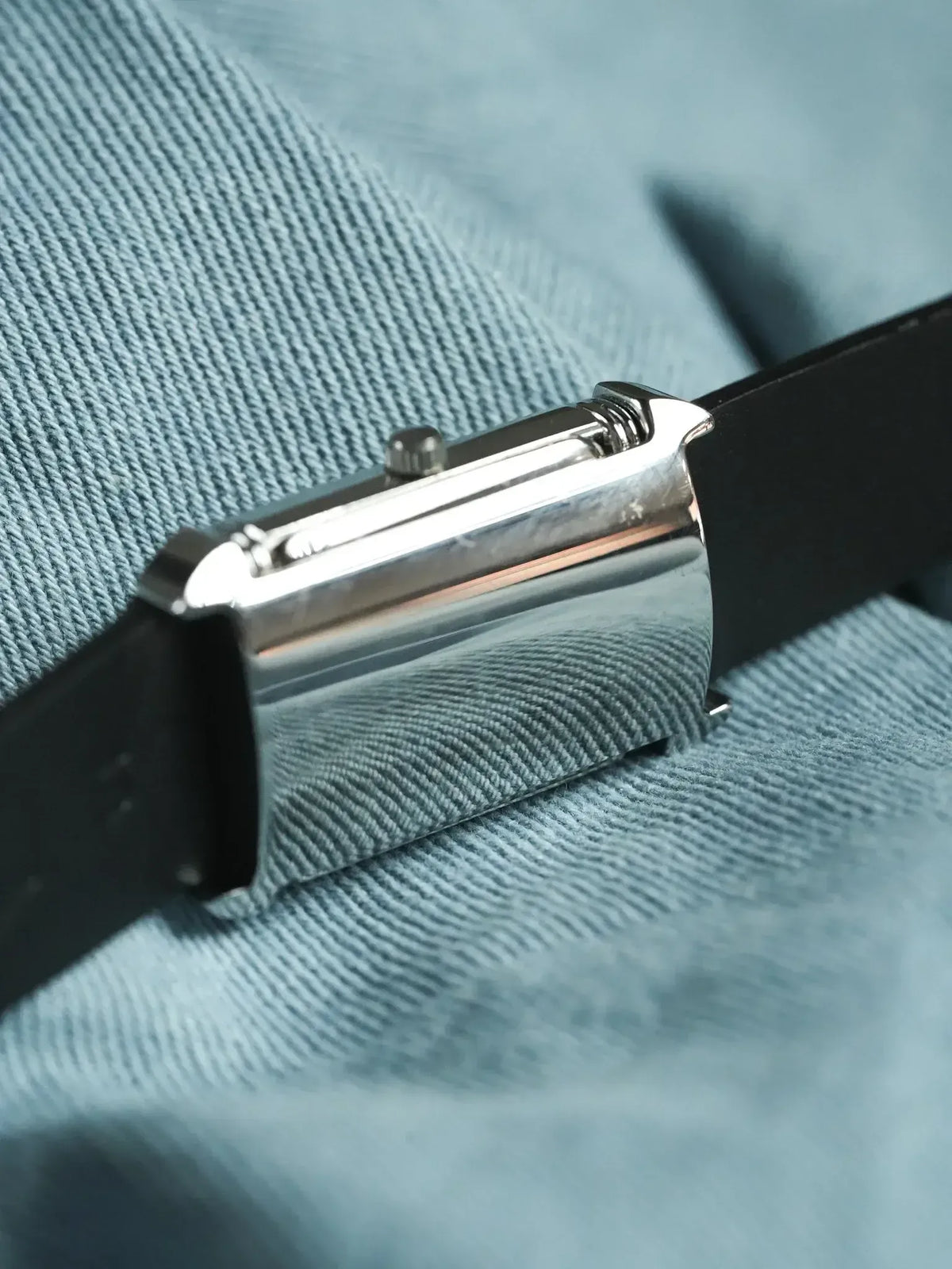 Cartier Tank vintage watch with polished steel case and black leather strap