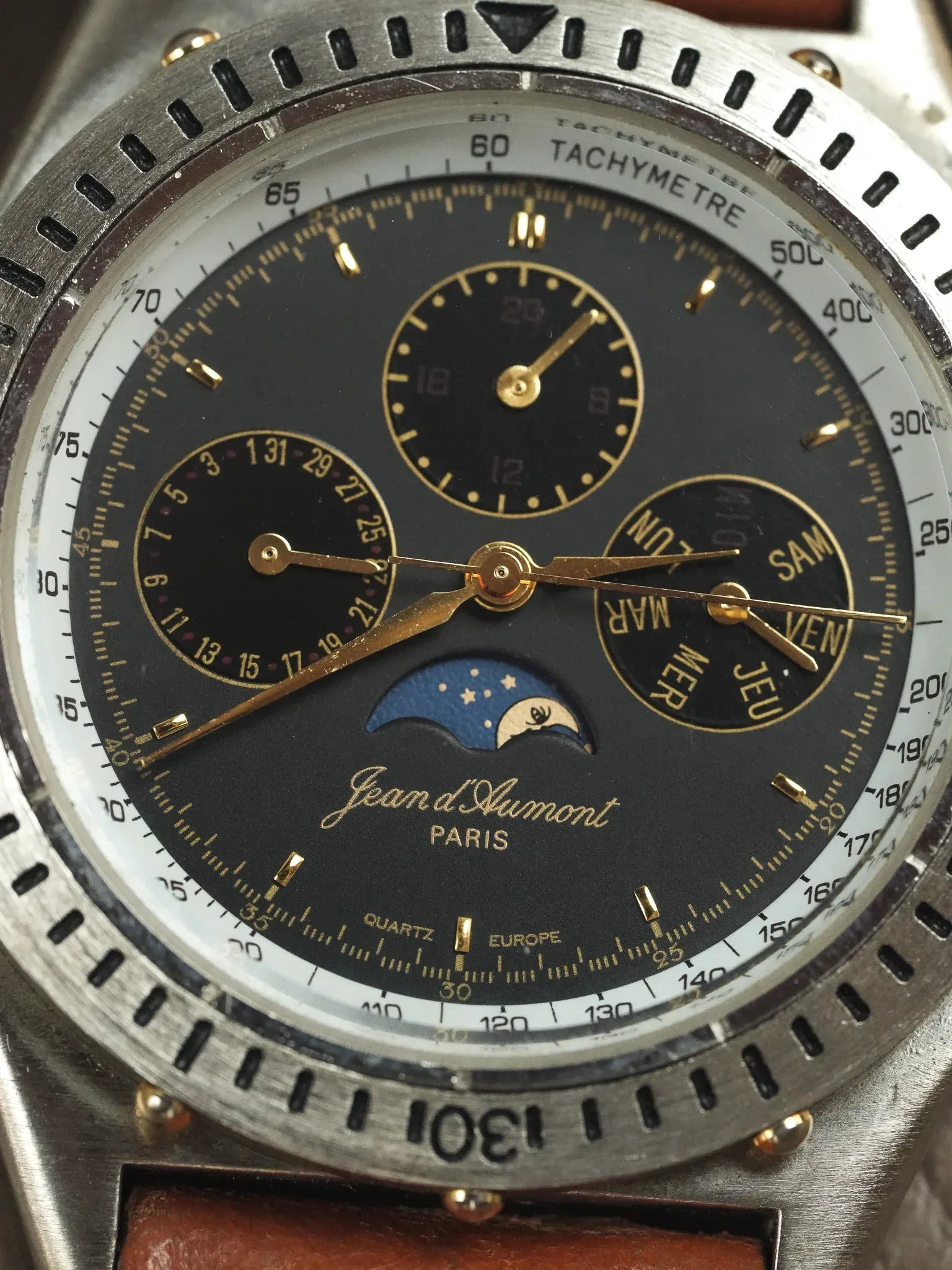 Jean d’Aumont Paris - Acier Triple Date Phase de lune Cadran noir - 1990s - Atelier Victor - Vintage Shop