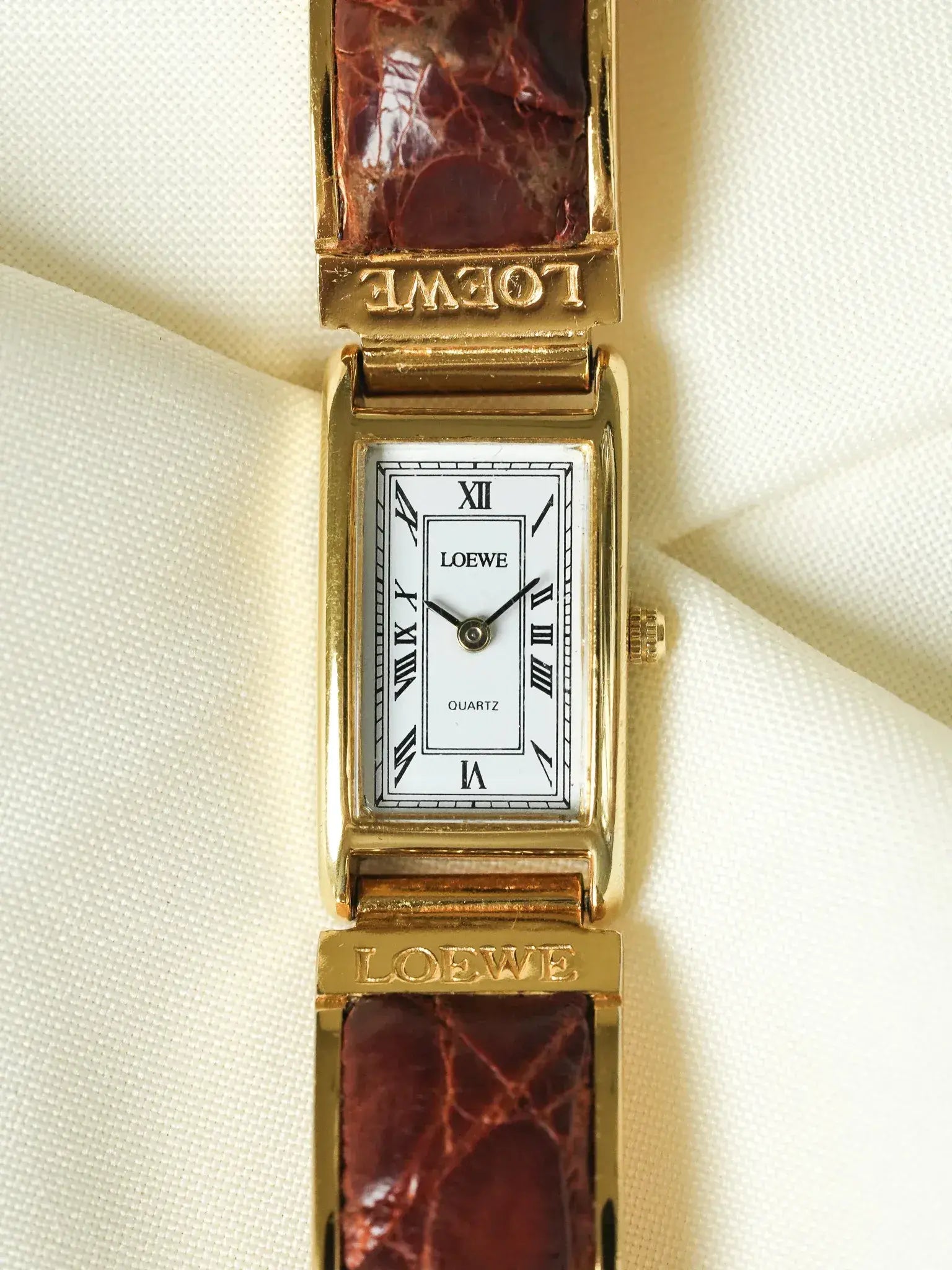 Loewe - Montre bracelet plaqué or cuir marron - 1990s - Atelier Victor