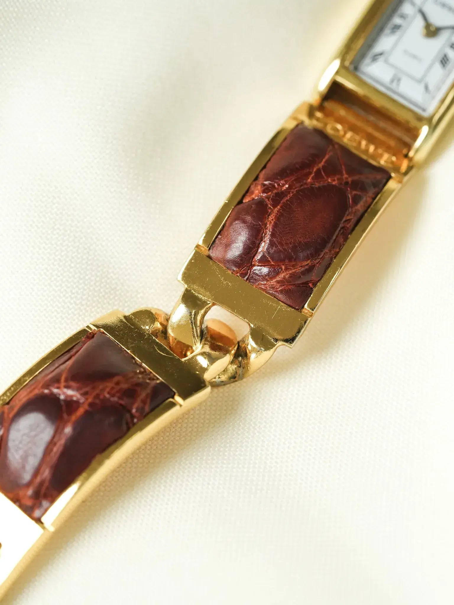 Loewe - Montre bracelet plaqué or cuir marron - 1990s - Atelier Victor