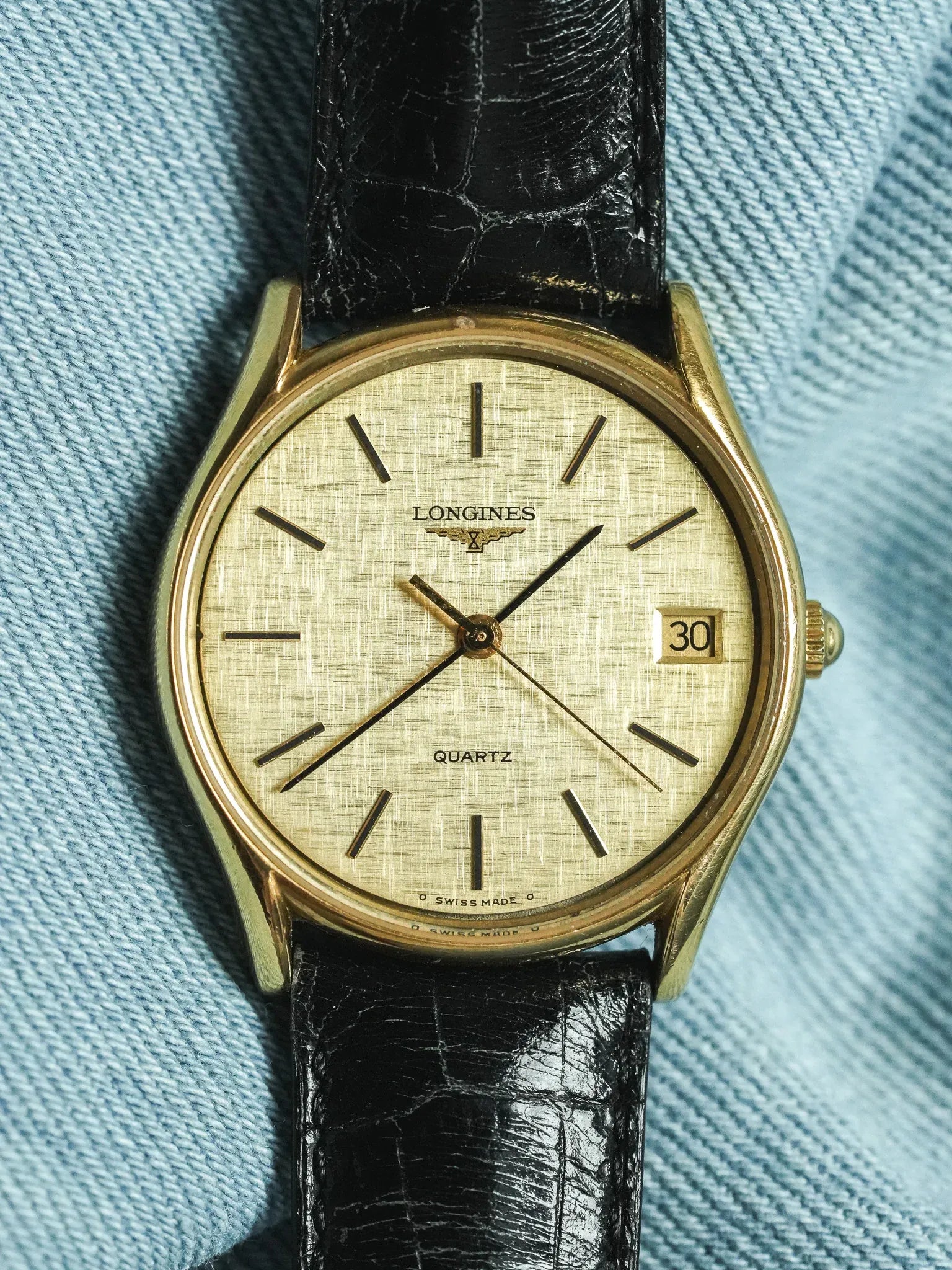 Longines - Cadran lin date plaqué or index onyx - 1980s - Atelier Victor - Vintage Shop