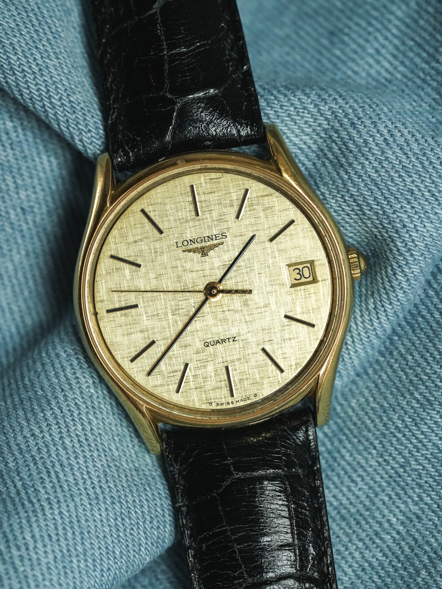 Longines - Cadran lin date plaqué or index onyx - 1980s - Atelier Victor - Vintage Shop