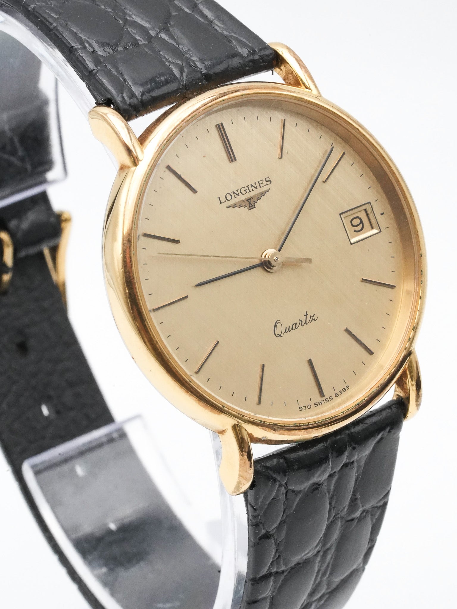 Longines - Circle Cadran doré lin date - 1980s - Atelier Victor - Vintage Shop