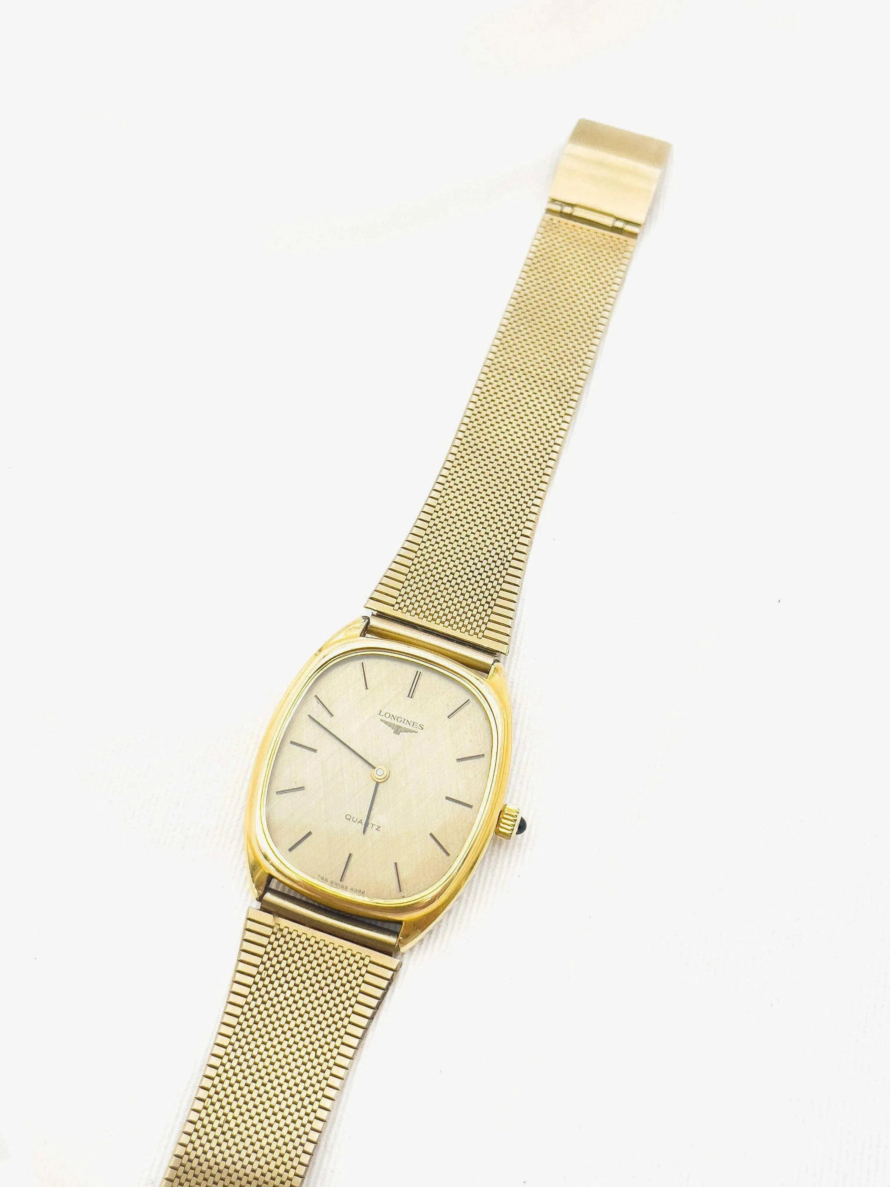 Longines - Gold Cabochon Tonneau quartz - 1980s - Atelier Victor Paris - Vintage Watch Shop Dubai