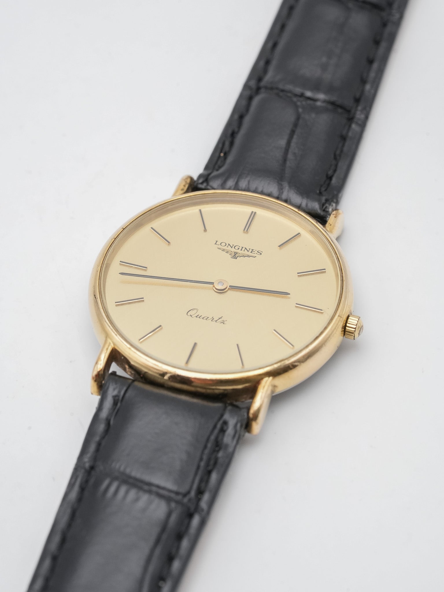 Longines - Ronde plaqué or lin - 1980s - Atelier Victor - Vintage Shop