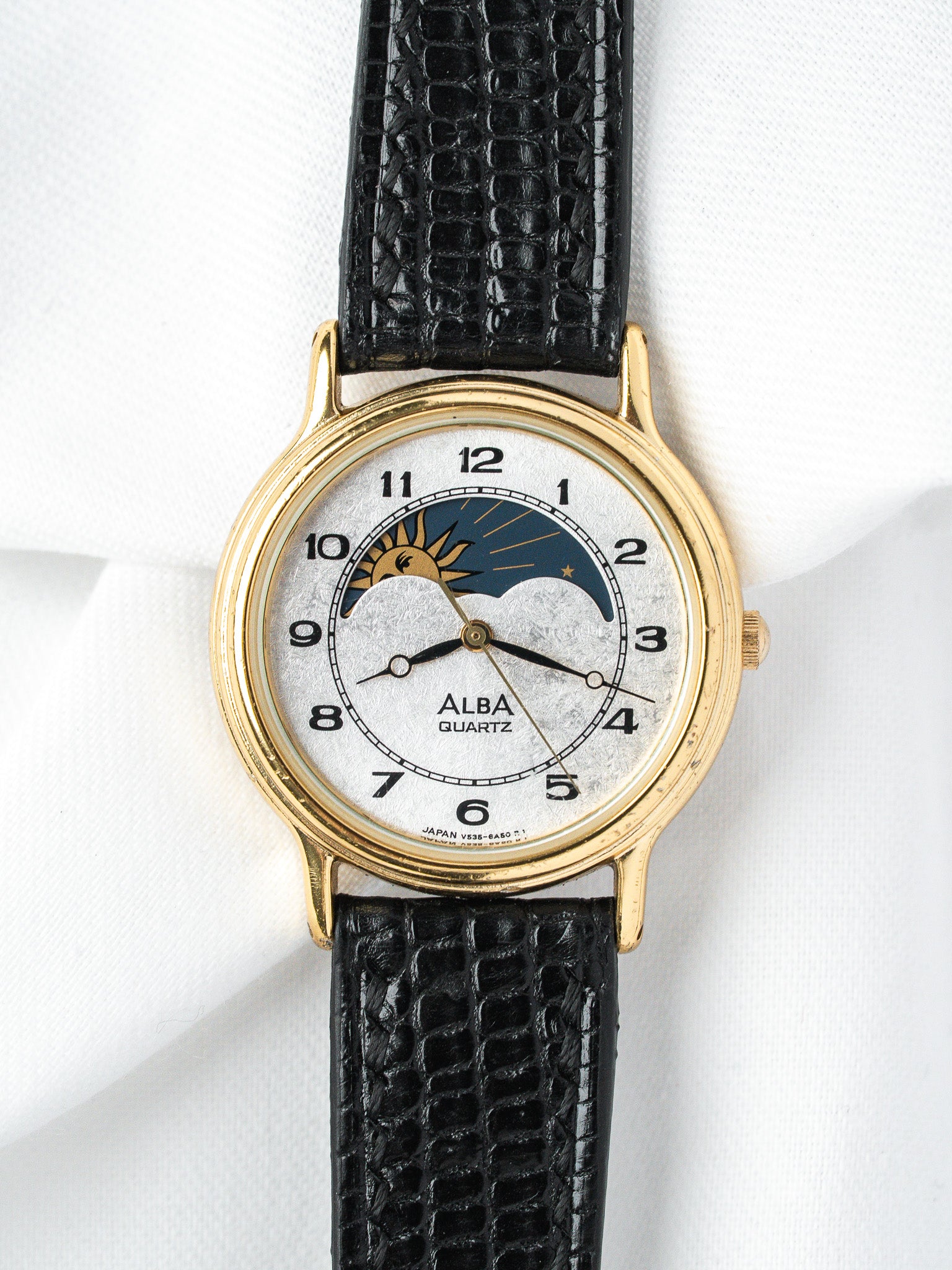 Montre Alba Soleil-Lune V535-6B10 — Cadran Argenté Givré (1989)