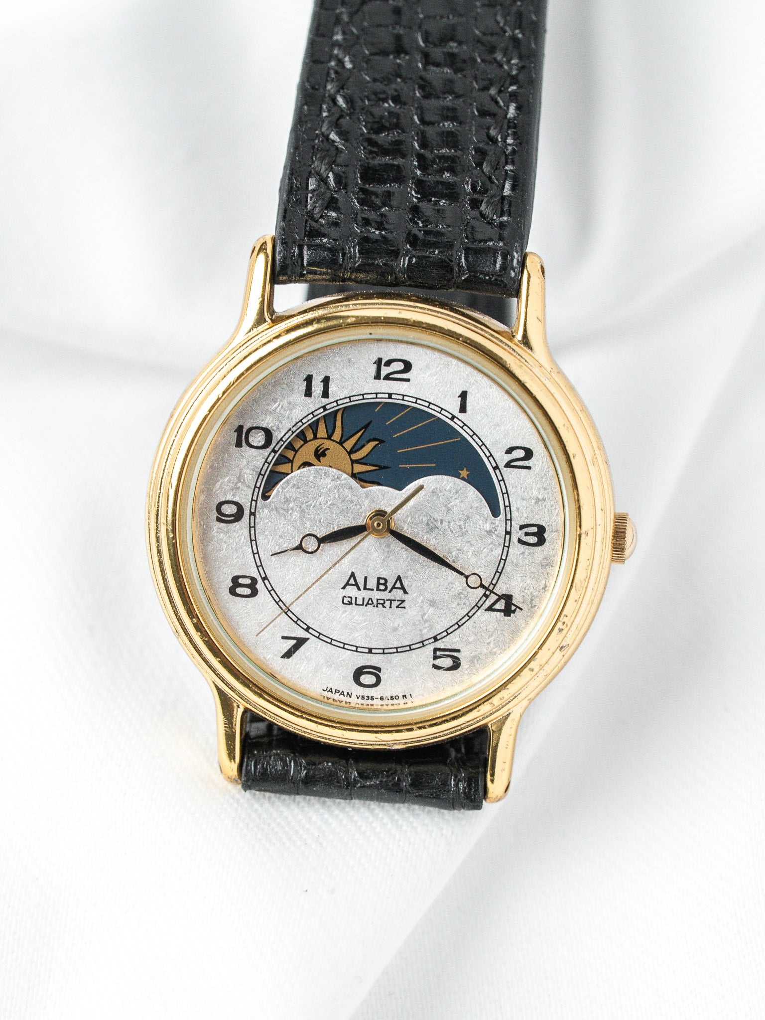 Reloj Alba Soleil-Lune V535-6B10 — Esfera plateada escarchada (1989)