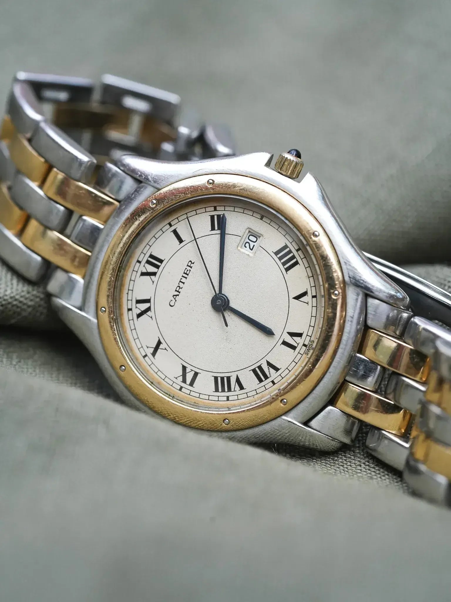 Cartier vintage watch with two-tone bracelet and Roman numeral dial