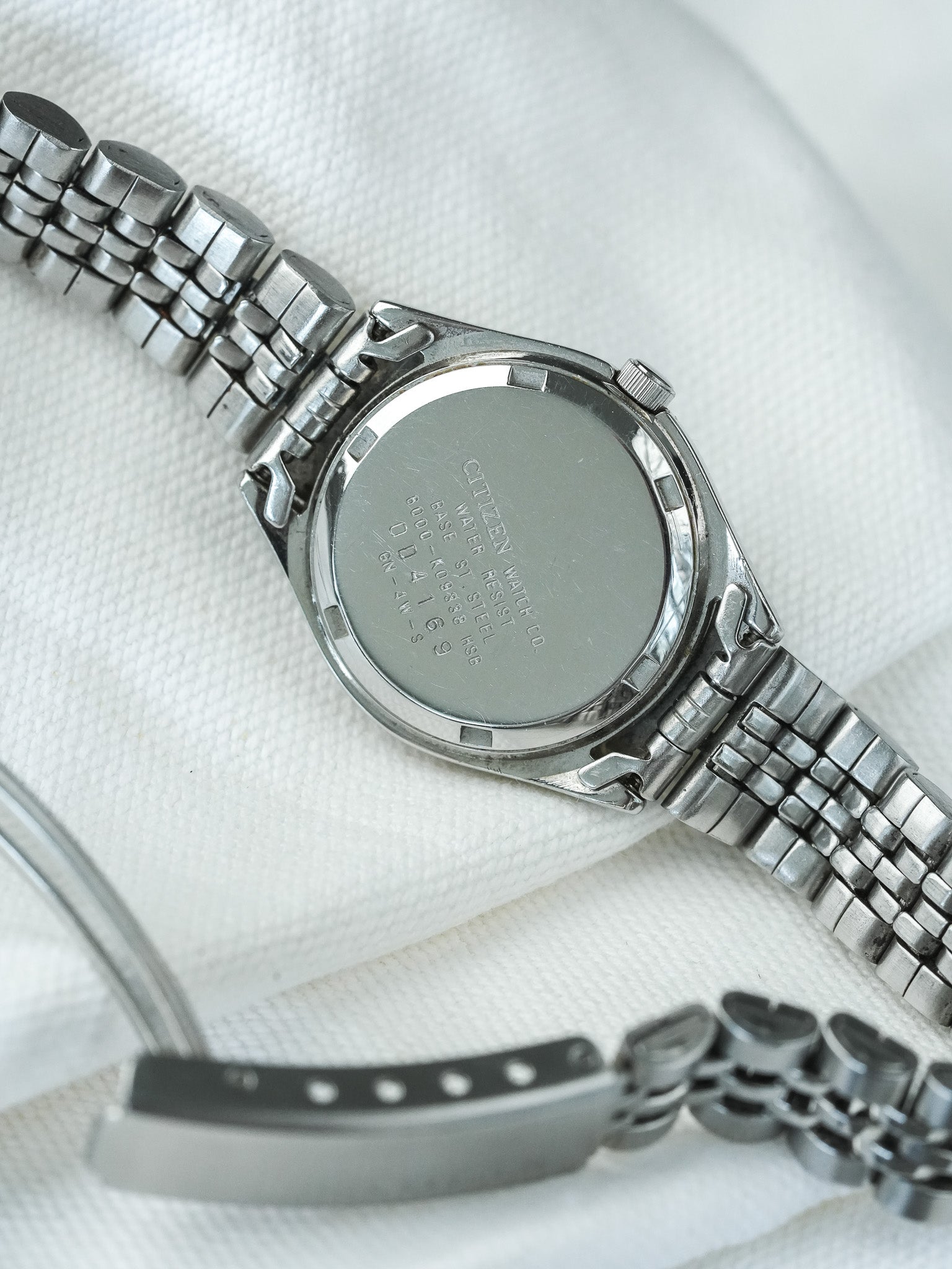 Orologio Citizen Daydate Facette 6000-K09338 in acciaio 26 mm 1980 vintage