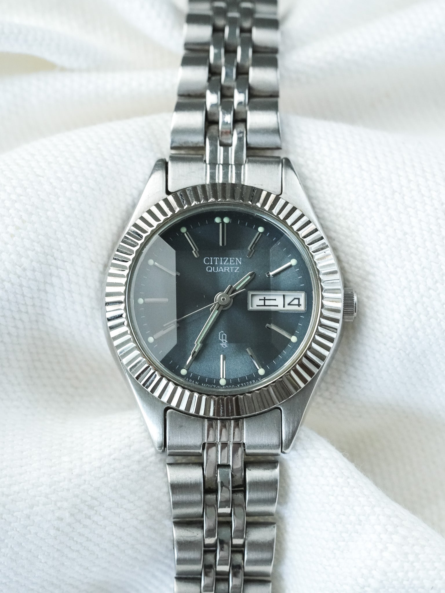 Orologio Citizen Daydate Facette 6000-K09338 in acciaio 26 mm 1980 vintage