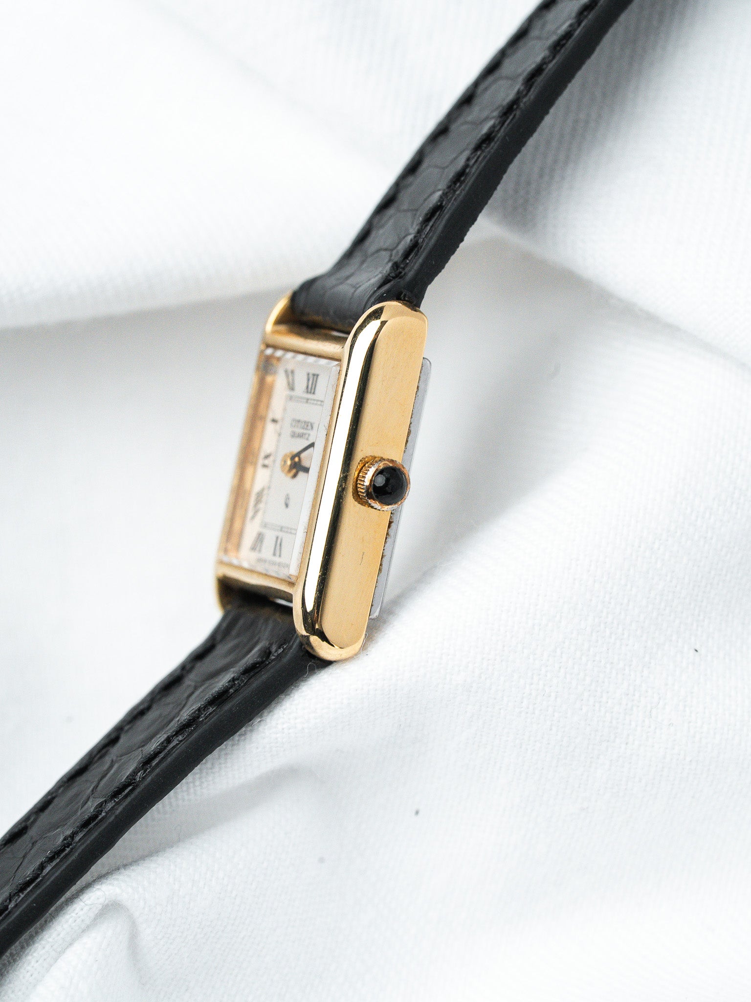 Cartier Tank vintage gold case white dial black leather strap