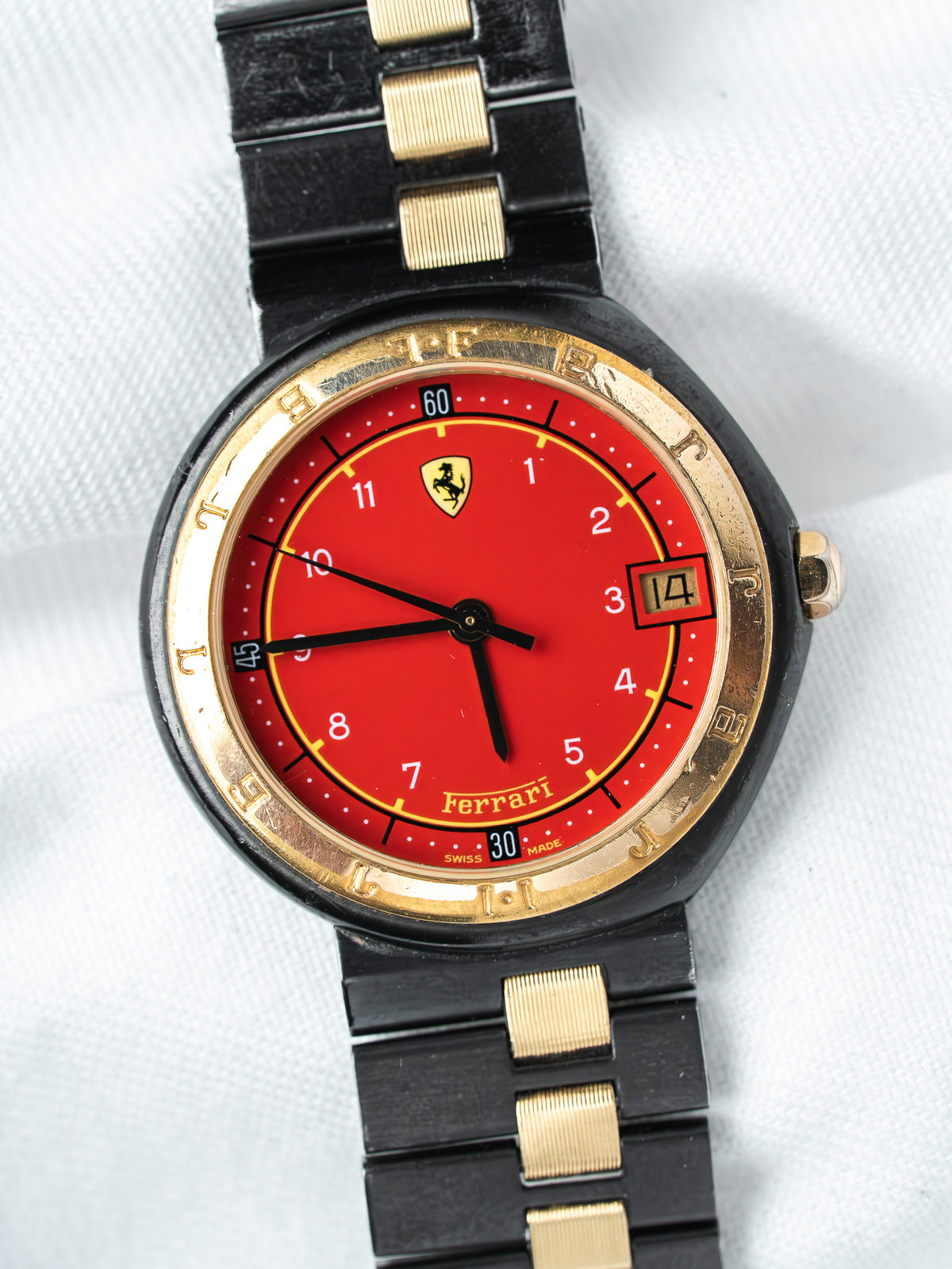 Ferrari vintage watch with red dial, black and gold bracelet, Swiss made
